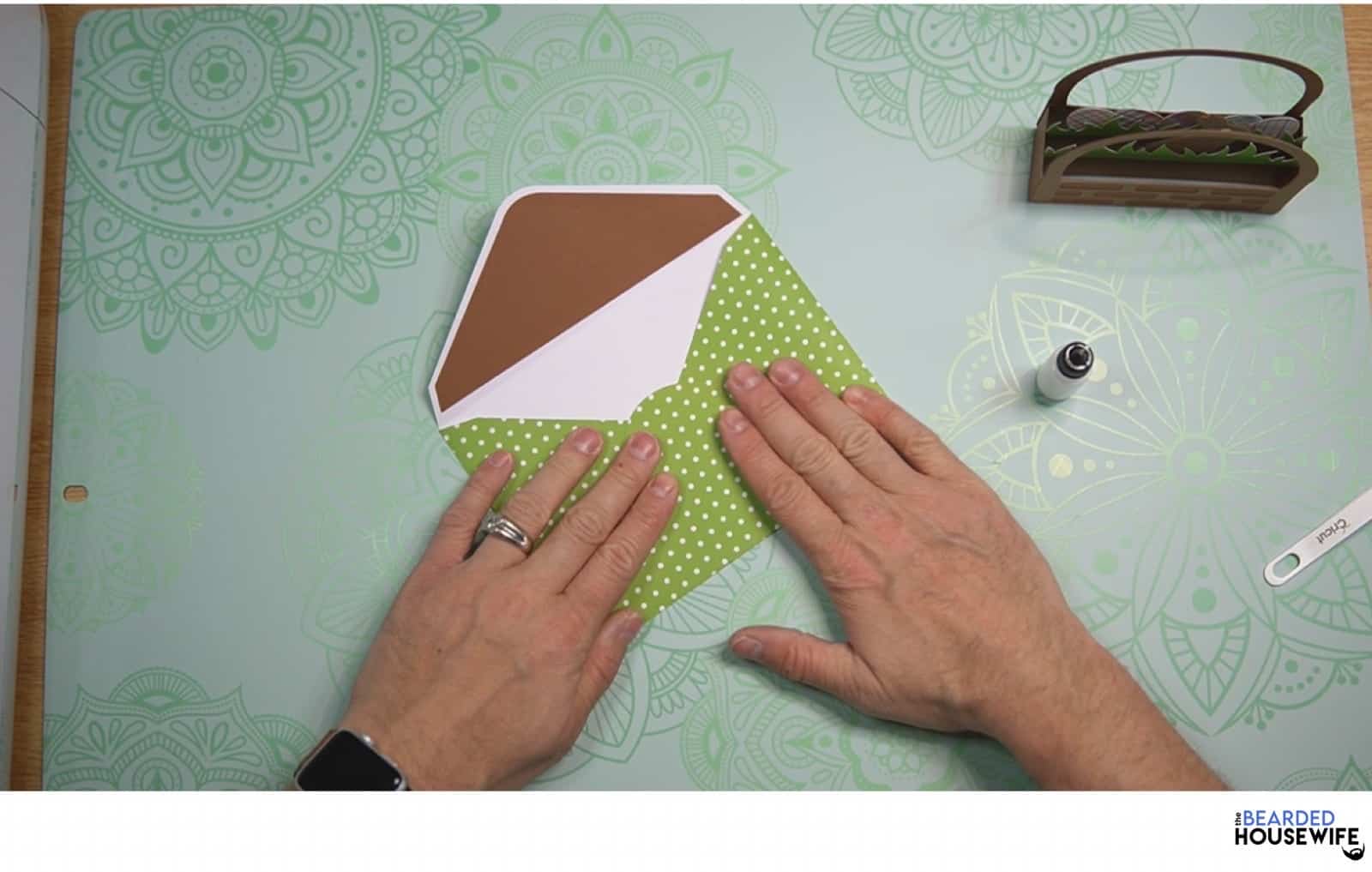 bring the bottom flap up to form the envelope