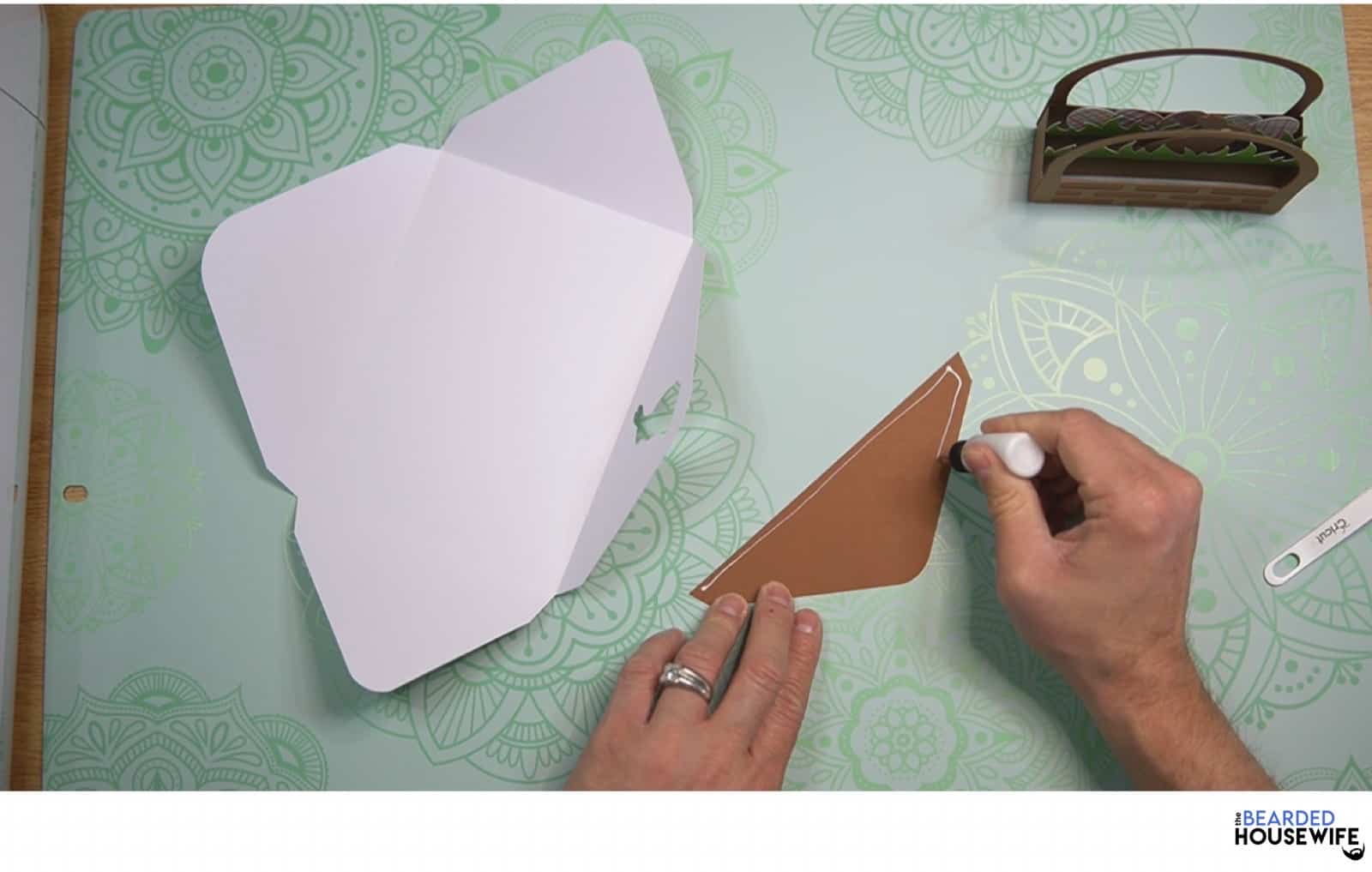 add glue along the outer edge of the inlay
