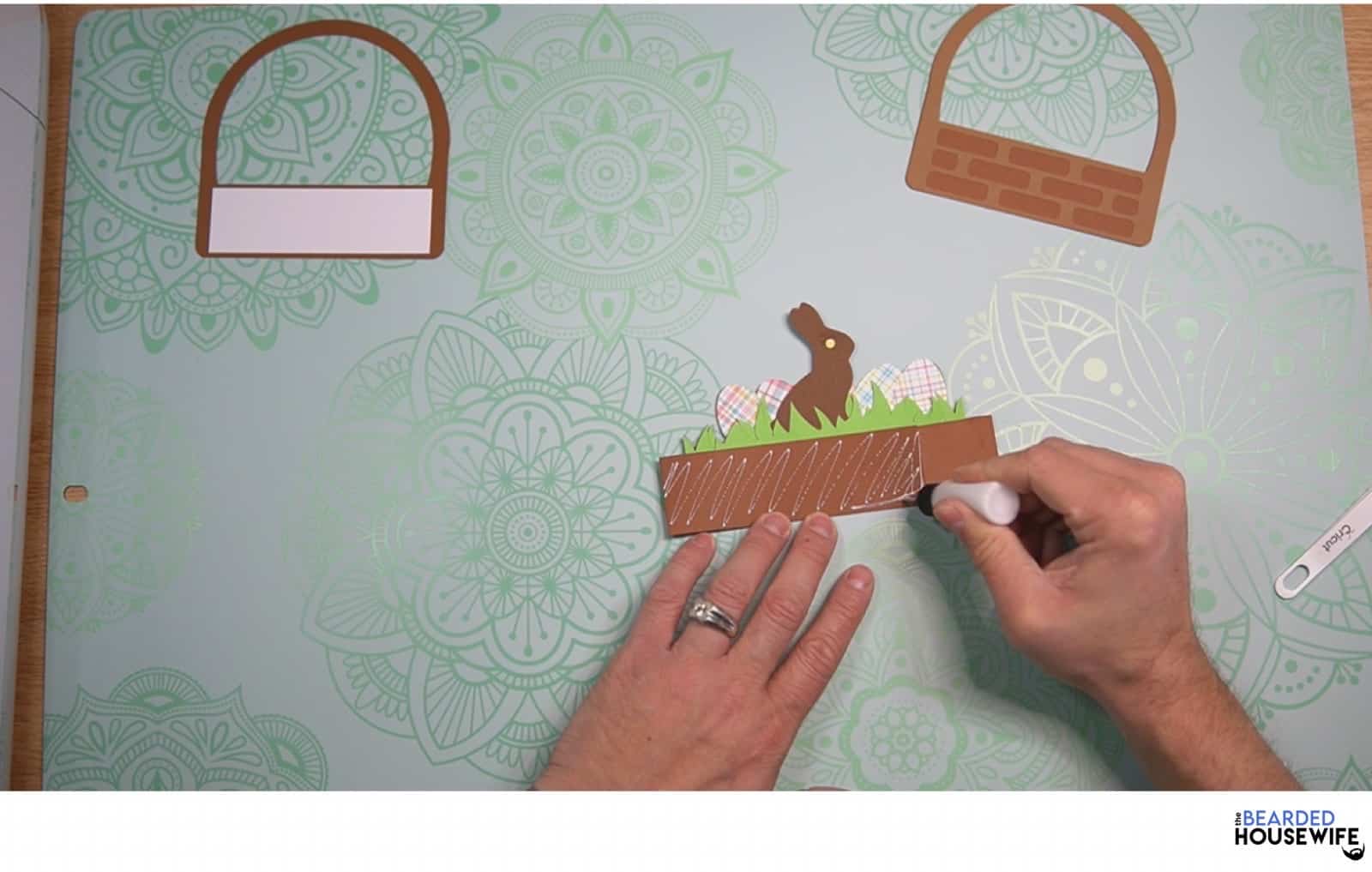 add glue to the front of the box