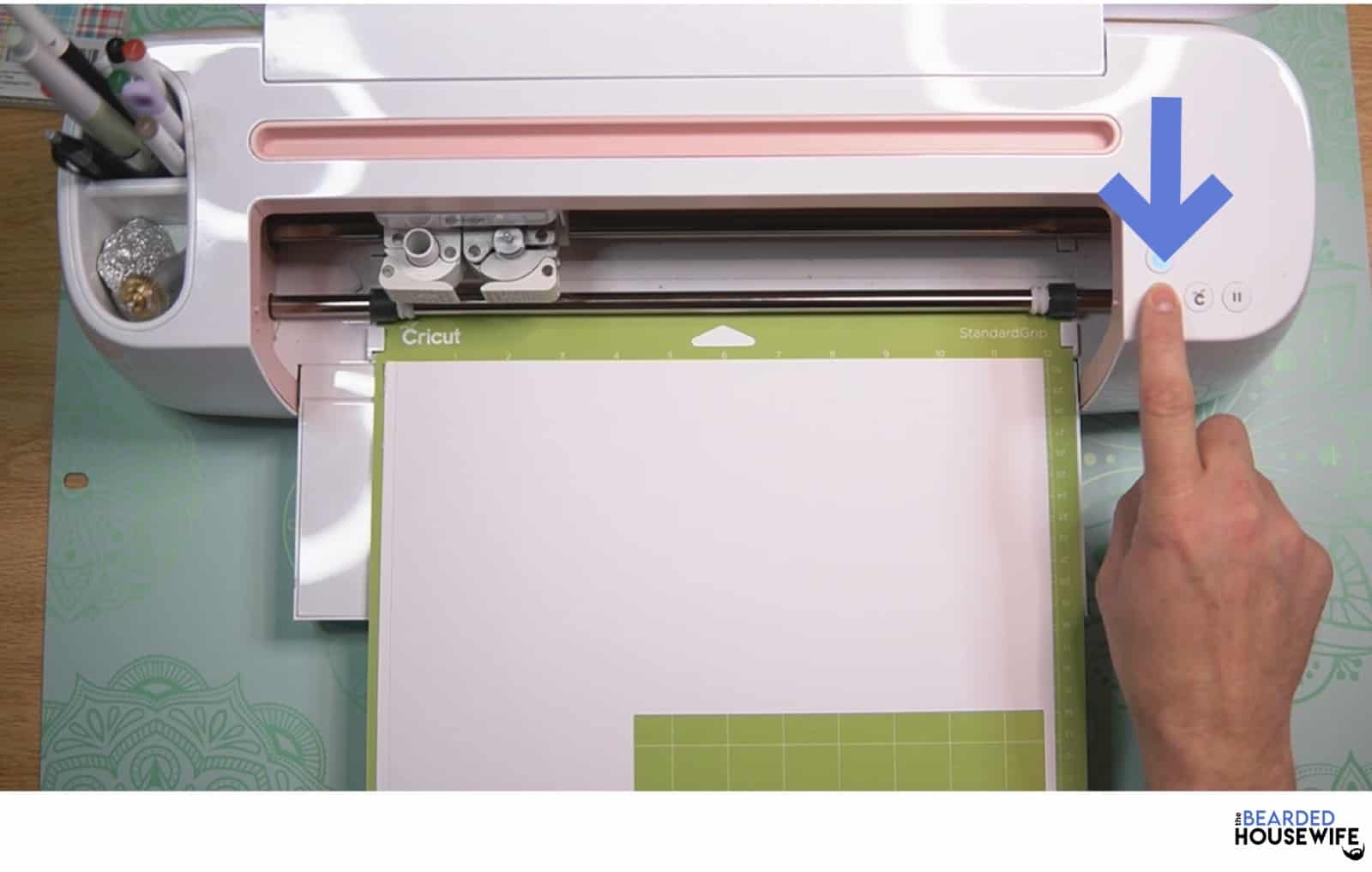load the mat by pressing the flashing arrows