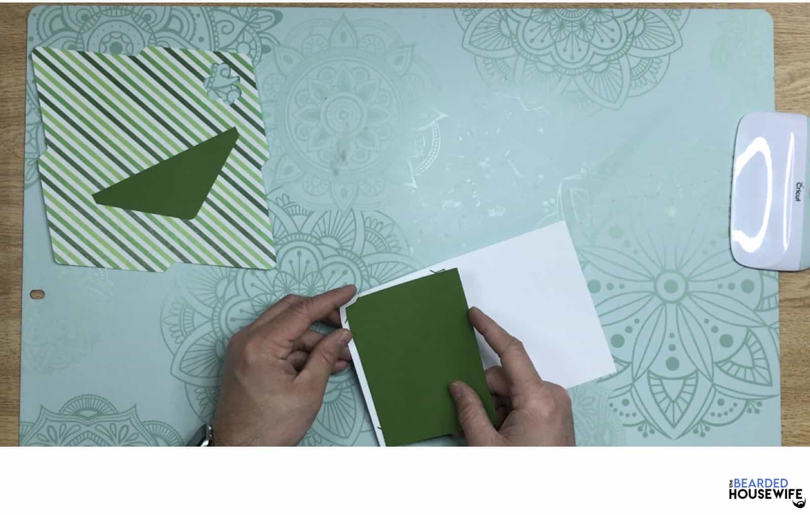 place the insert into the slits of the card base