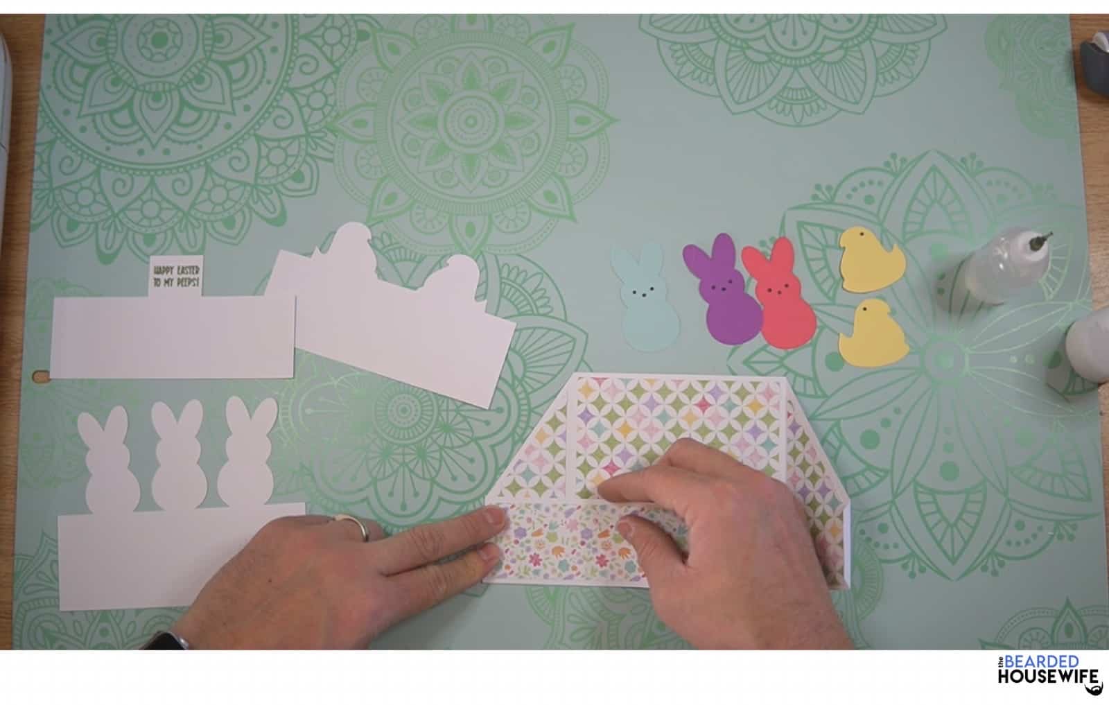 attach the front box piece to the card base