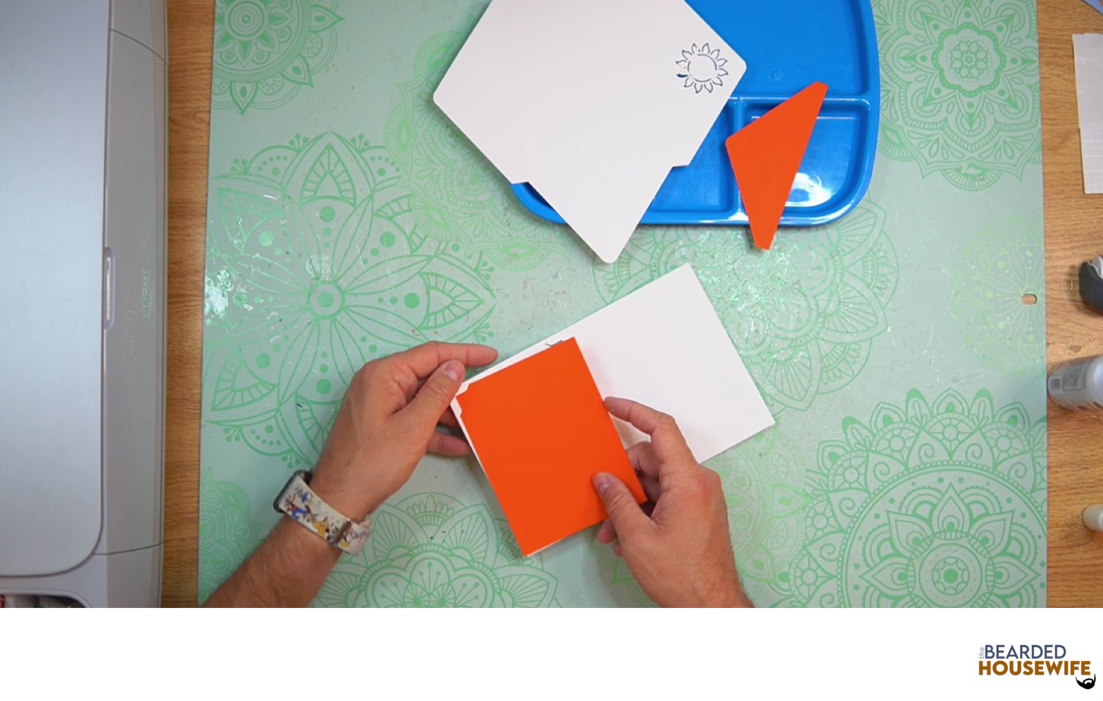 feed the insert into the slits on the card base