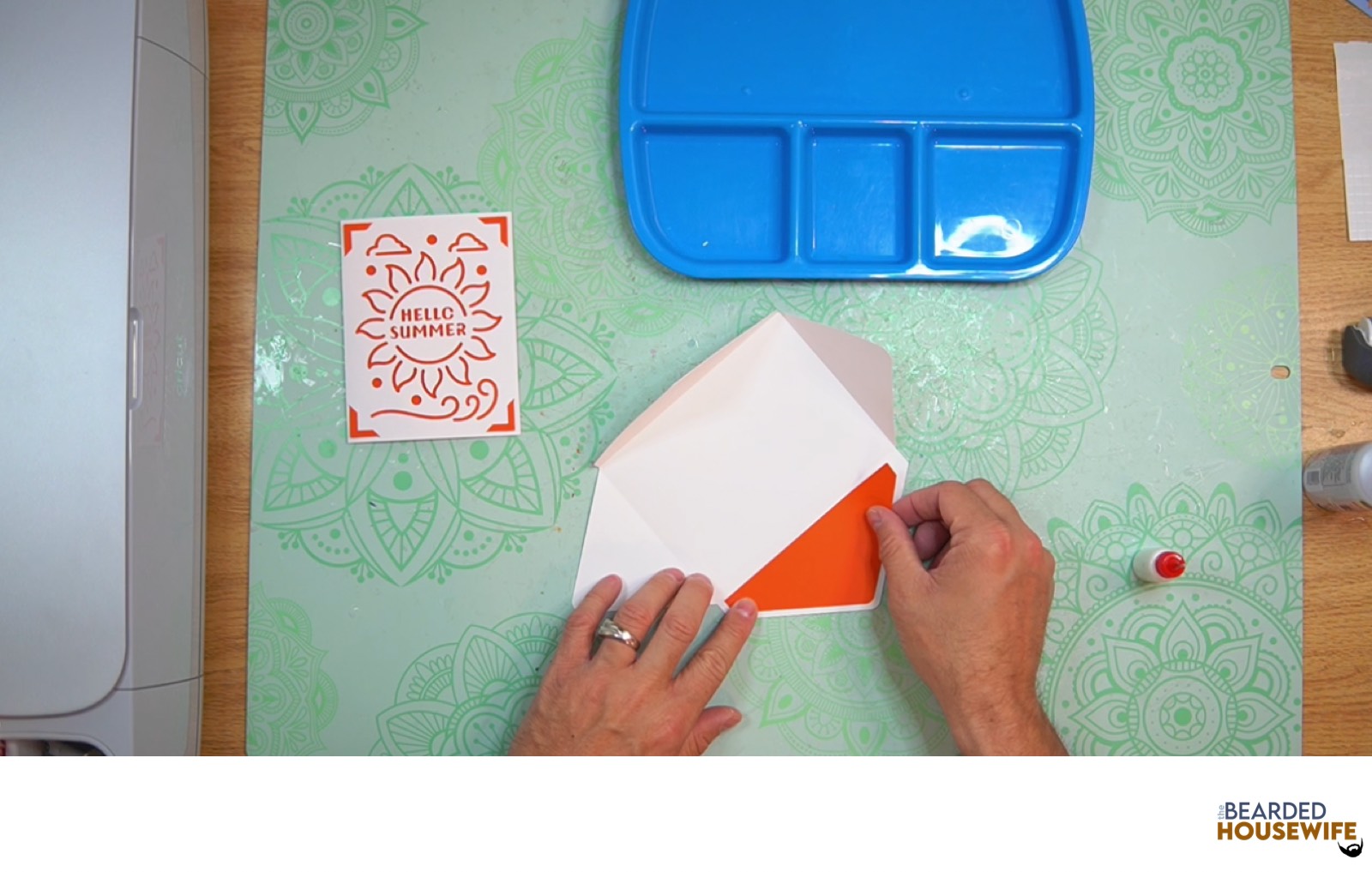 add the inlay to the cutout on the envelope flap