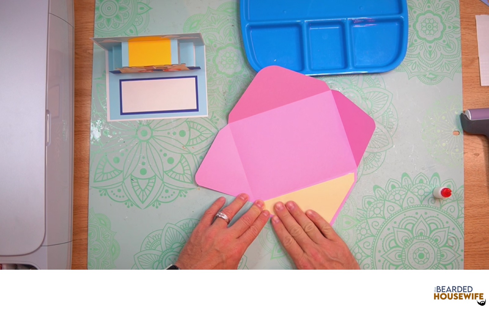 add the inlay over the cutout on the envelope