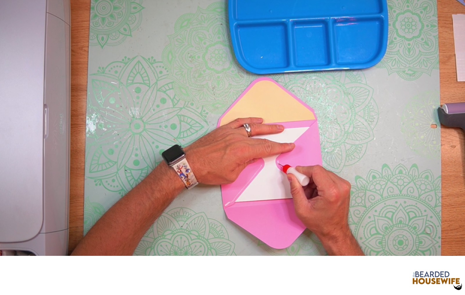 add glue along the bottom of the side flaps