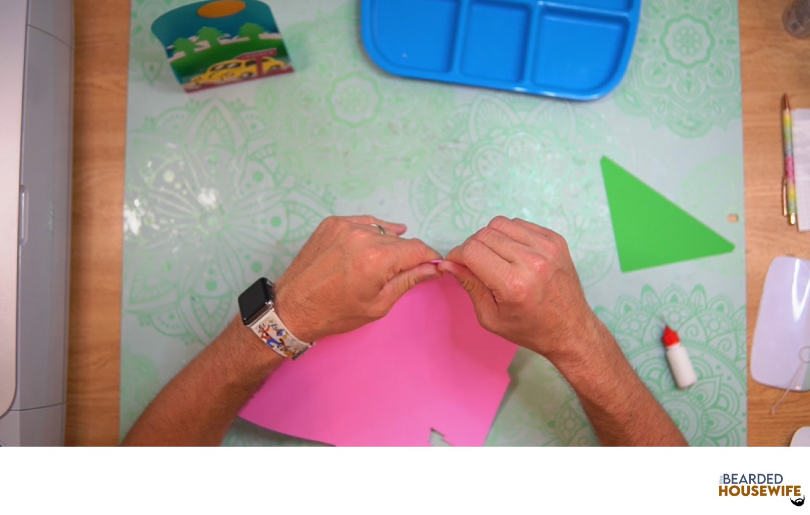 fold the envelope along the score line