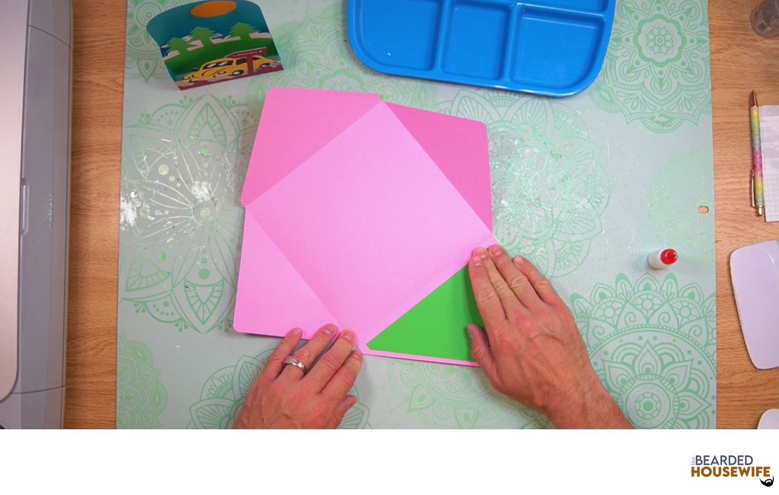 add the inlay over the cutout on the envelope