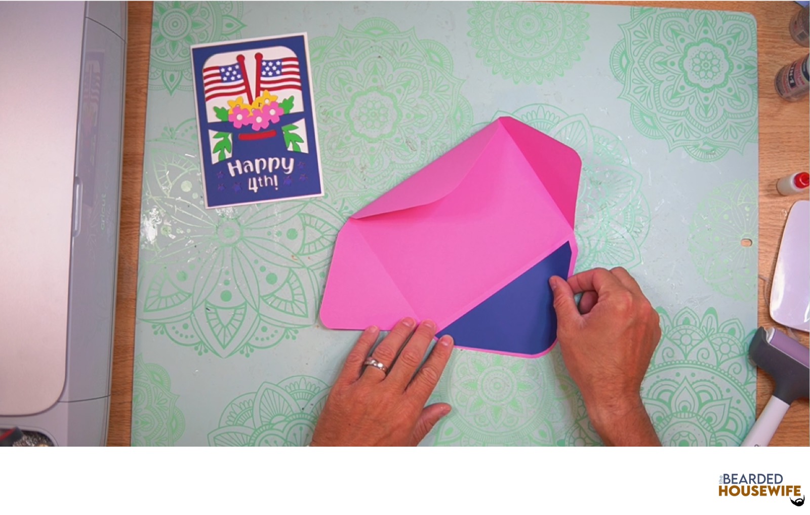 add the inlay to the cutout on the envelope flap