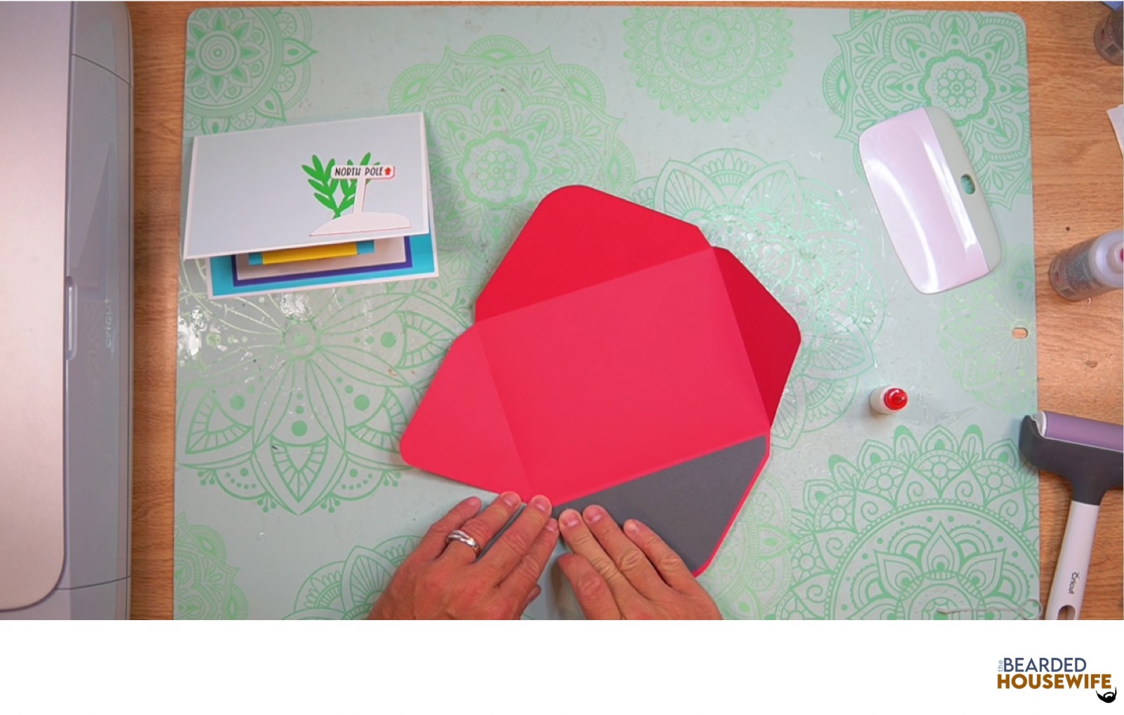 attach the inlay over the cutout on the envelope flap