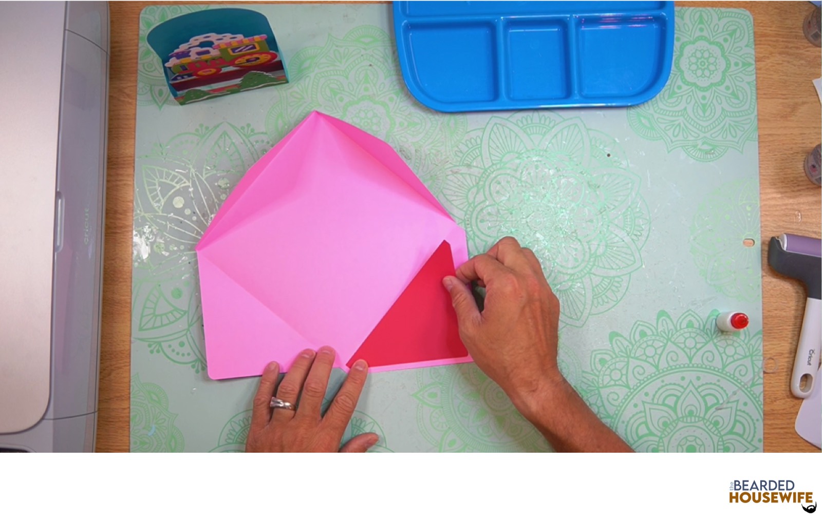 attach the inlay over the cutout on the envelope flap