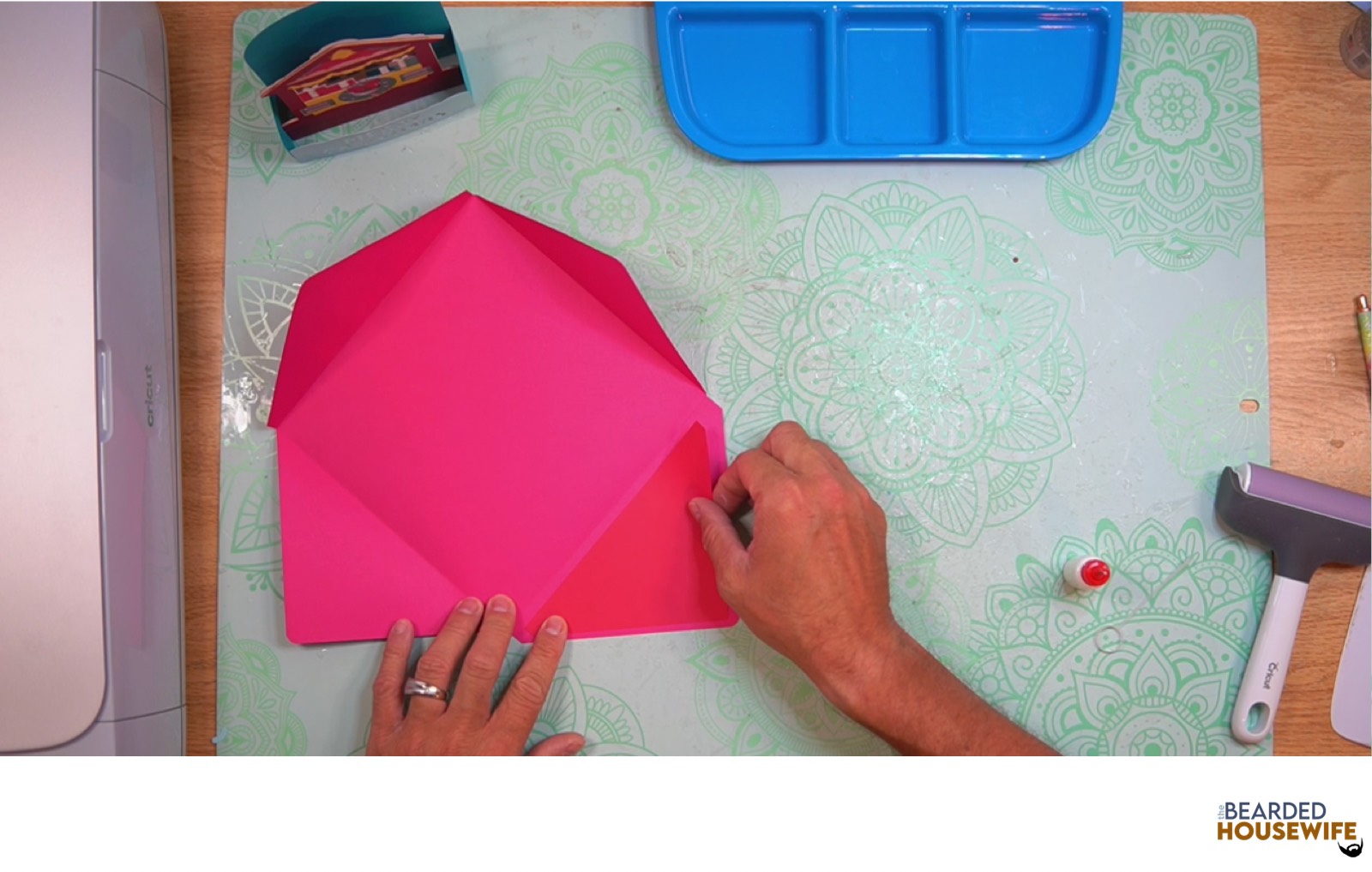 attach to the cutout on the envelope flap