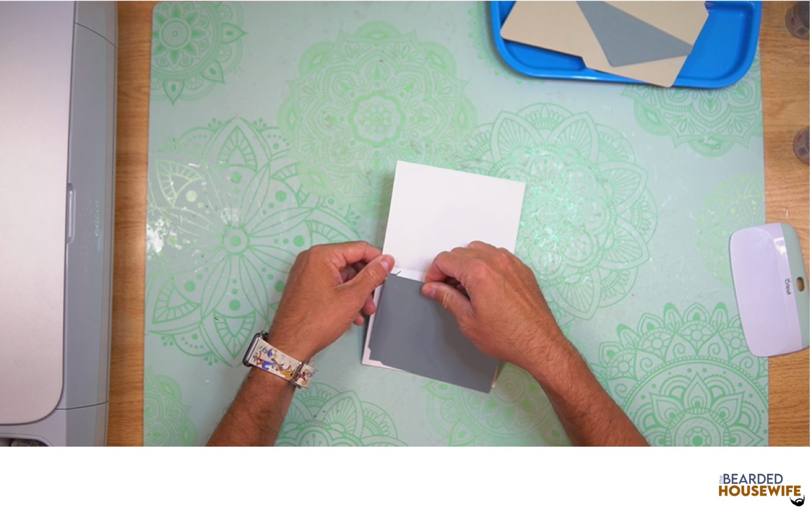 feed the insert into the slits on the card