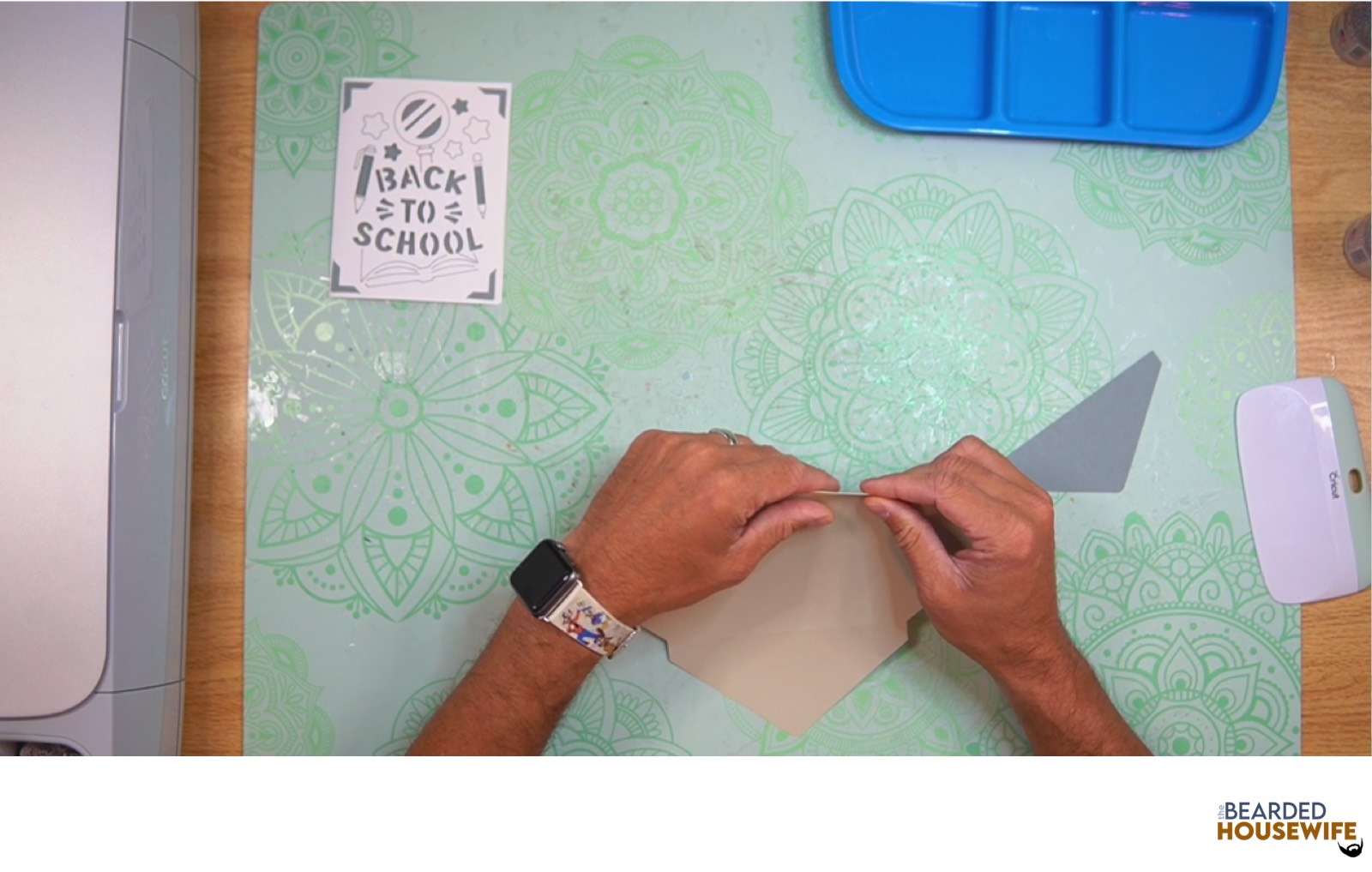 fold the envelope along the score lines