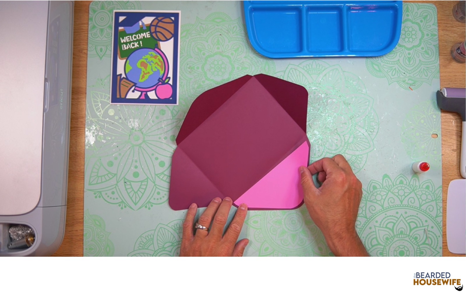 attach the inlay over the cutout on the envelope