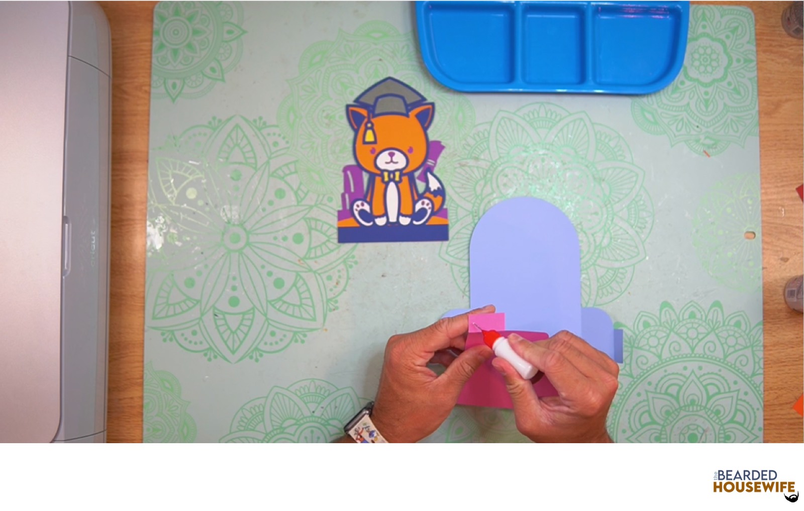 add glue to the left tab on the inside tab piece