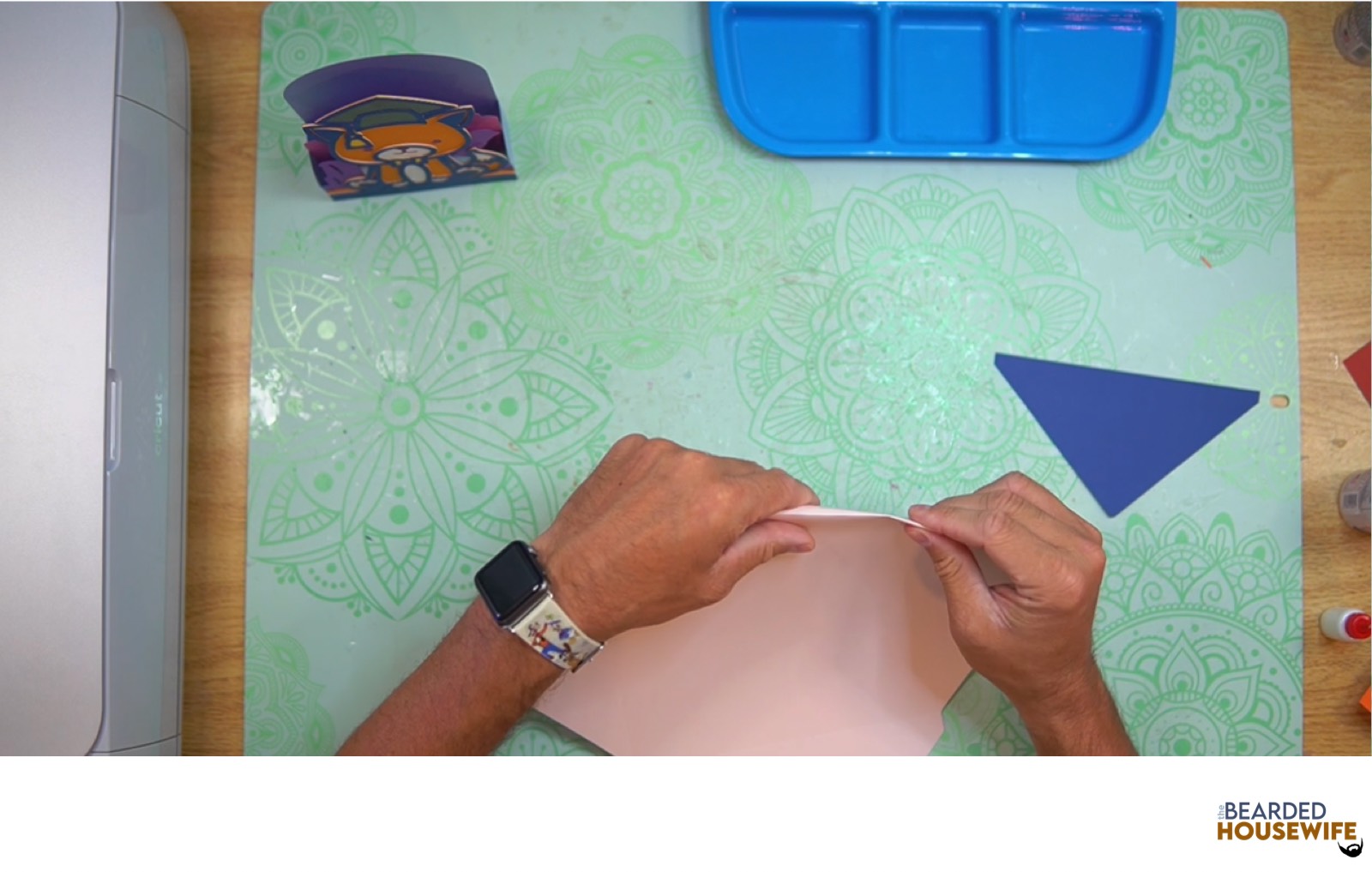 fold the envelope along the score lines