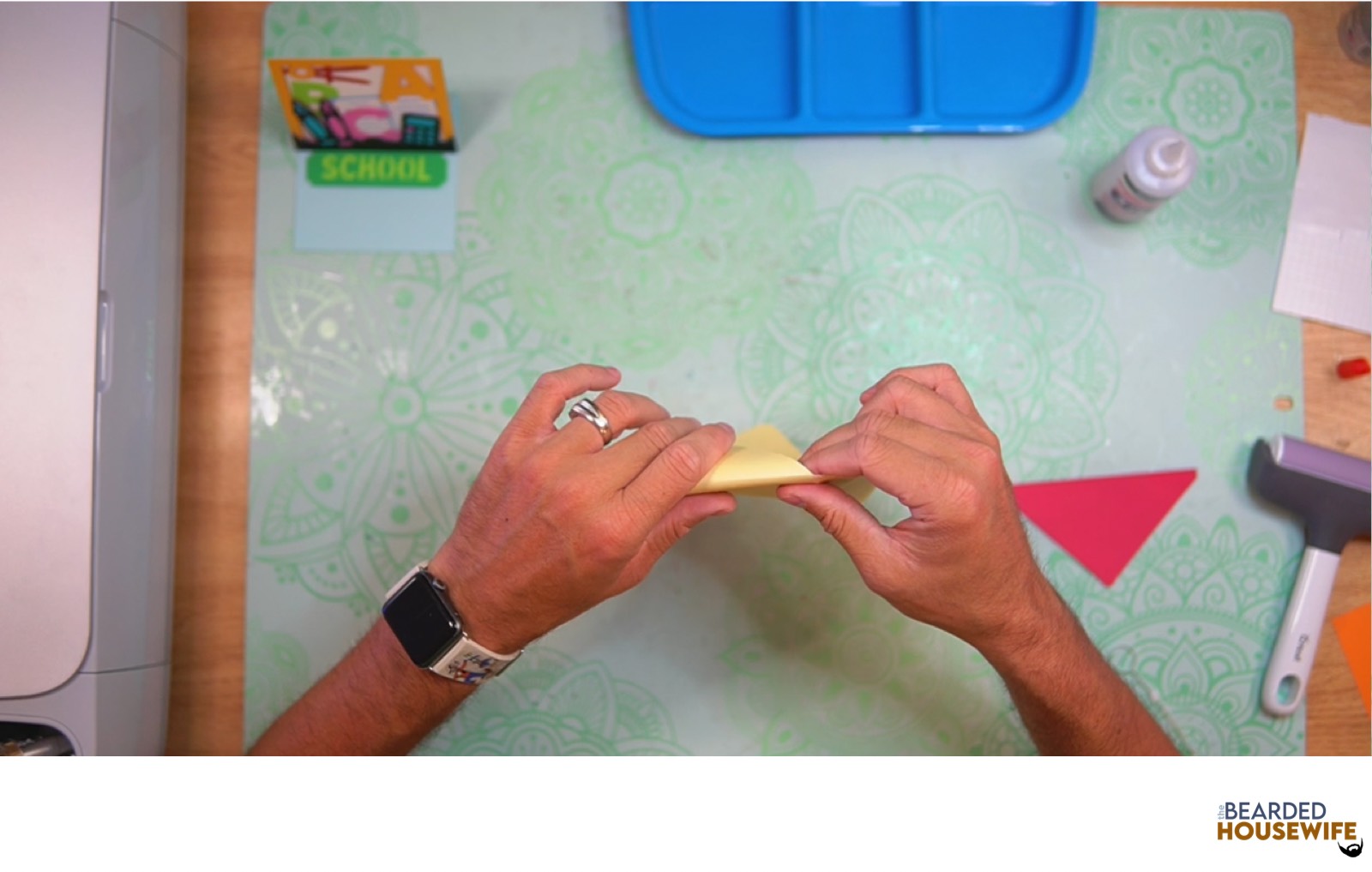 fold the envelope along the score lines