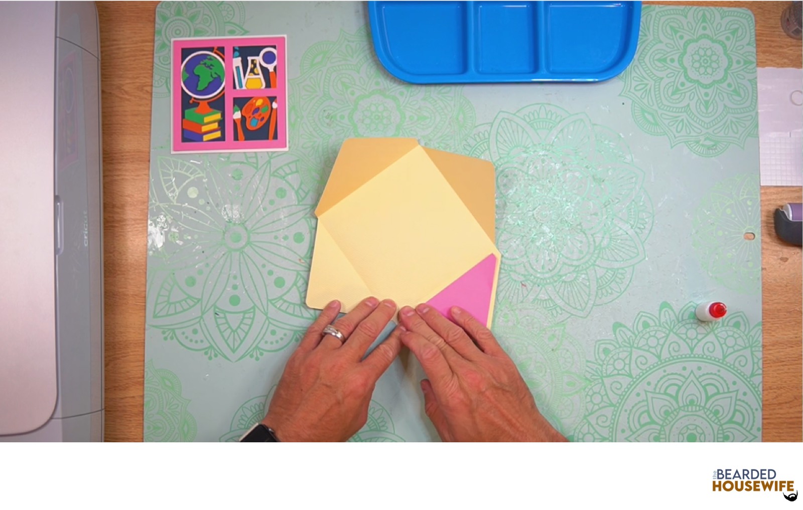 attach the inlay over the cutout on the envelope flap