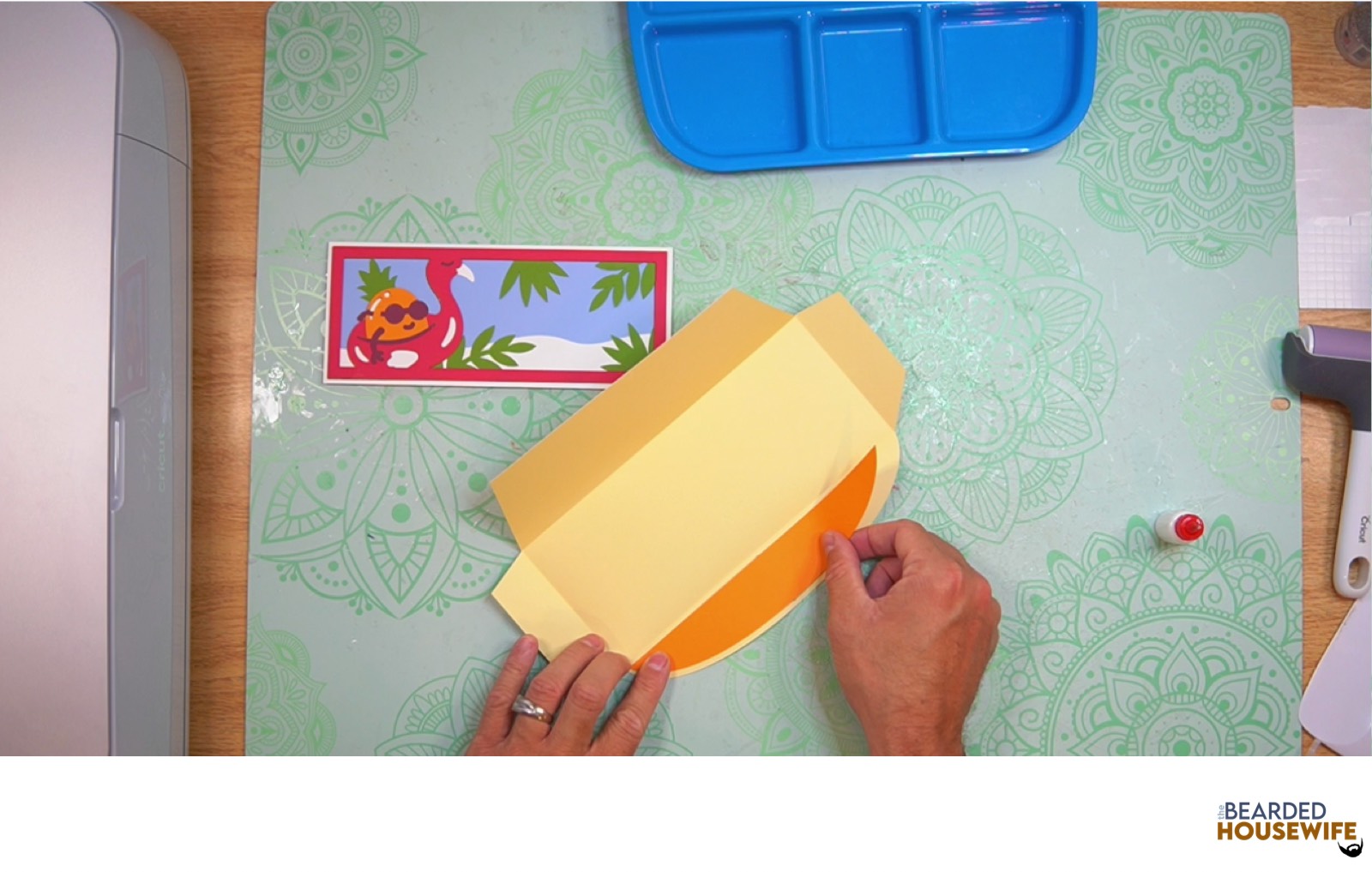 place inlay over the cutout on the envelope flap