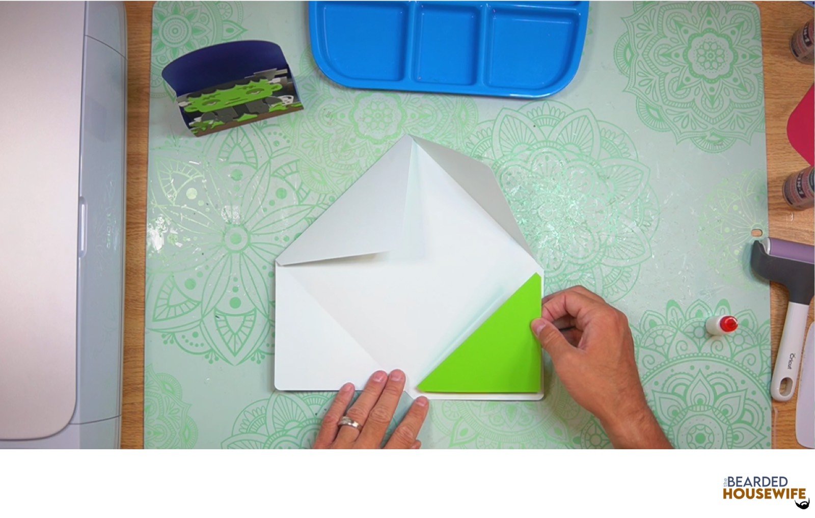 attach the inlay over the cutout on the envelope