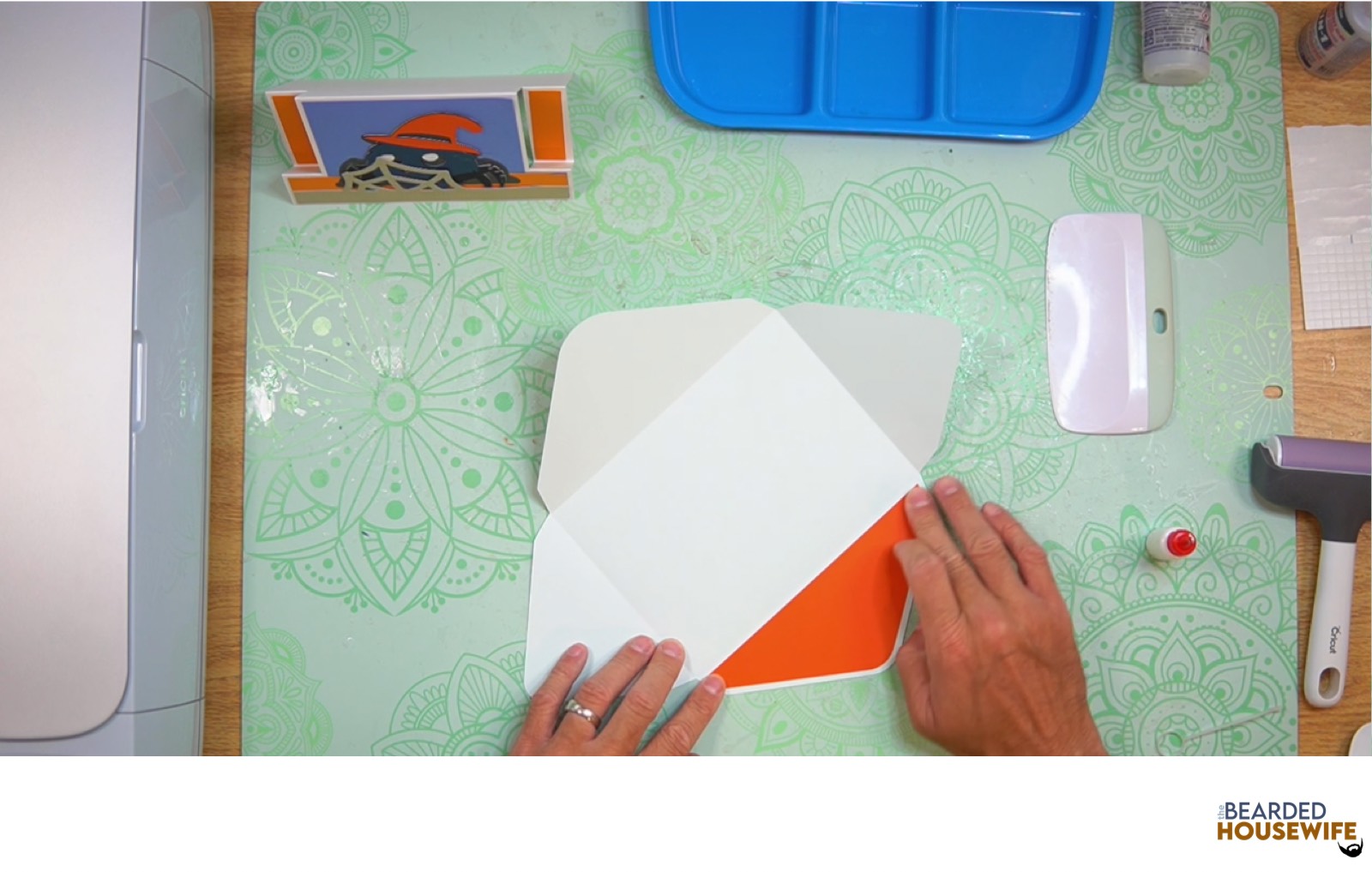 add the inlay over the cutout on the envelope flap