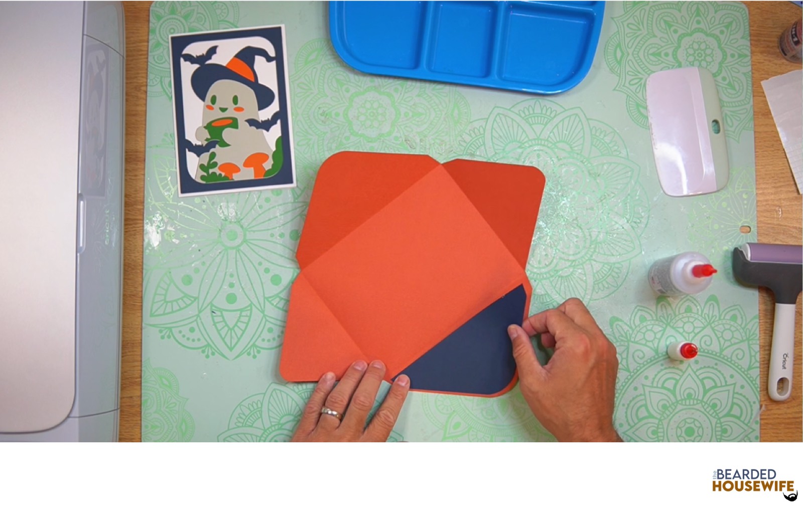 add the inlay over the cutout on the envelope