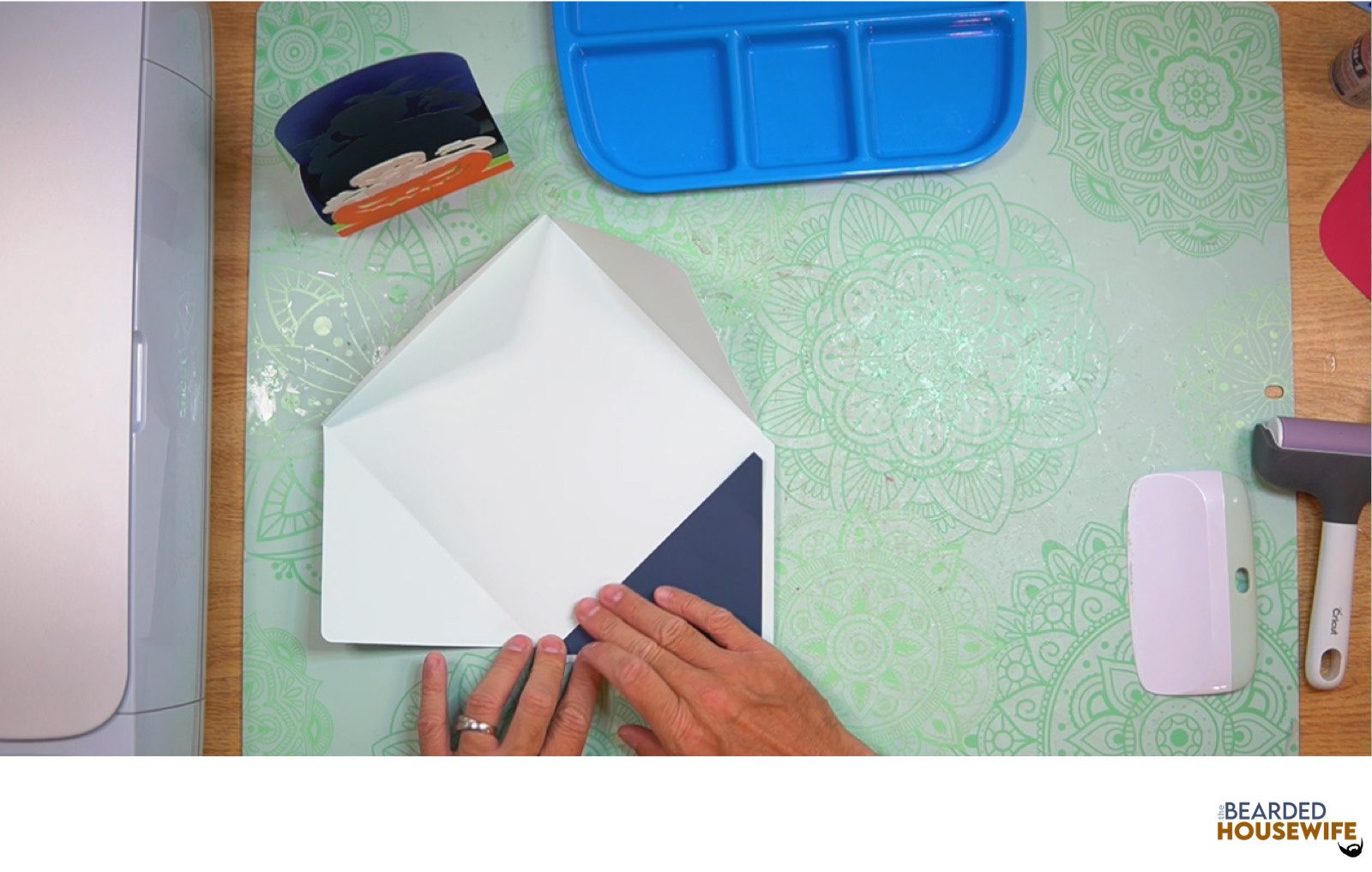 attach the inlay over the cutout on the envelope