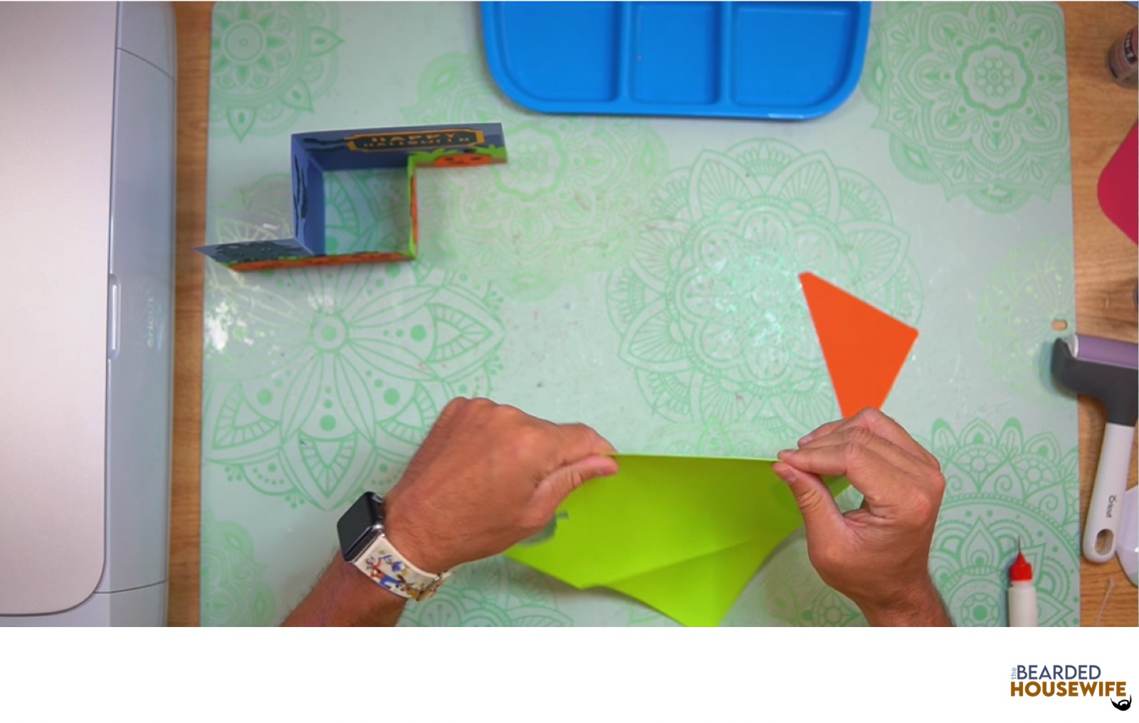 fold the envelope along the score lines