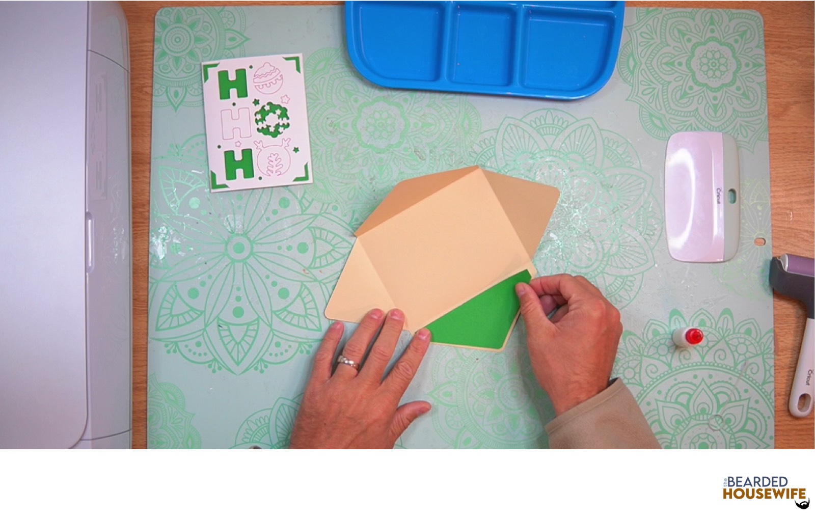 place the inlay over the cutout on the envelope flap