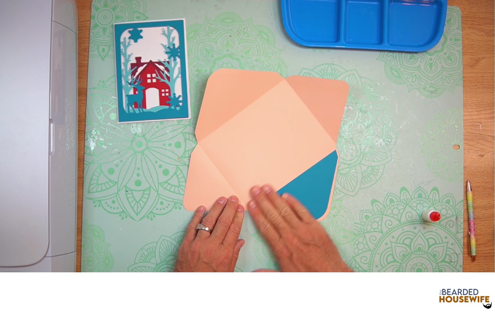 add the inlay over the cutout on the envelope