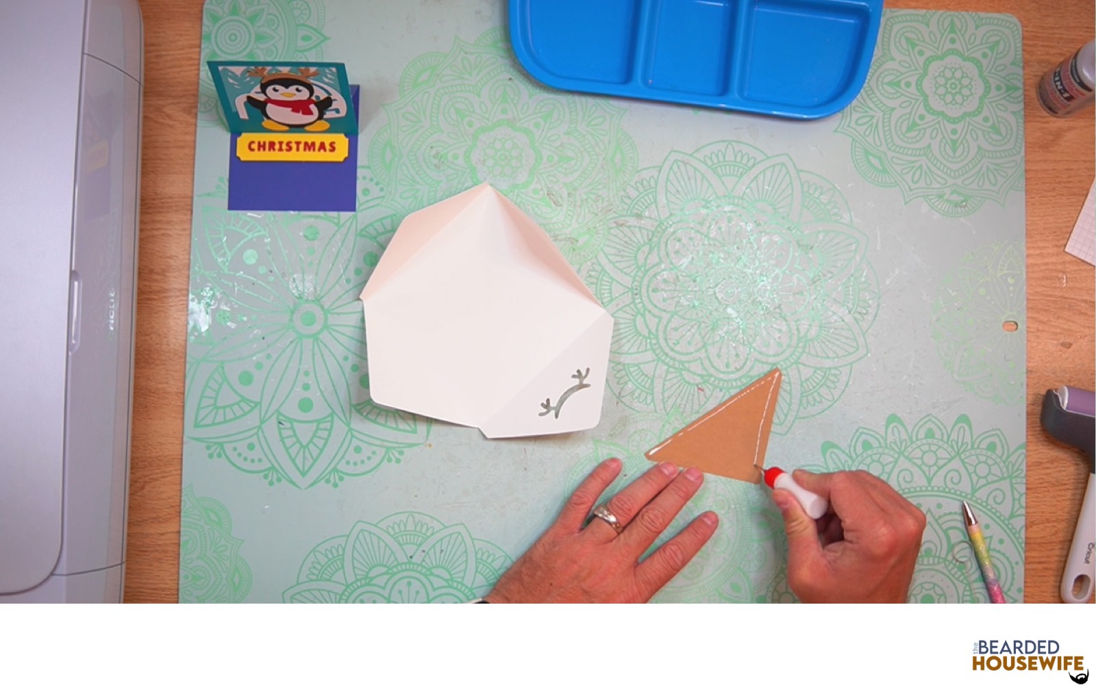 add glue along the outer edge of the inlay panel