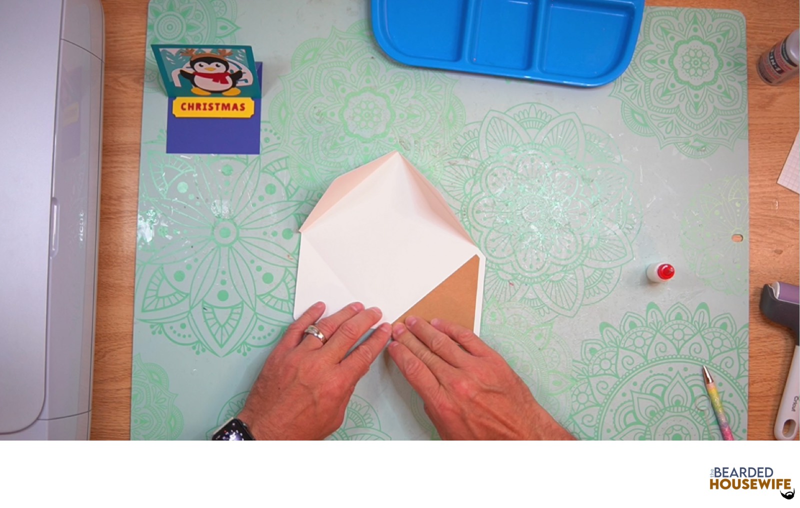 attach the inlay to the envelope