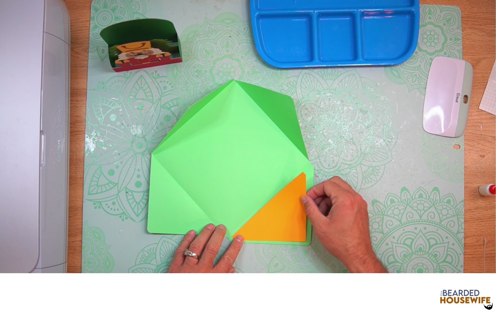 attach the inlay over the cutout on the envelope