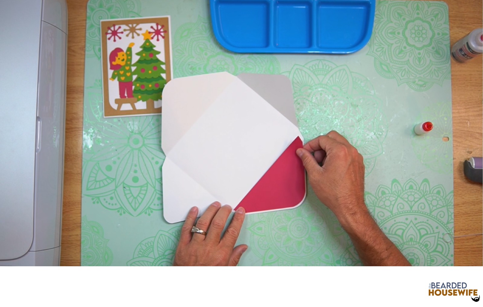 attach the inlay to the cutout on the envelope