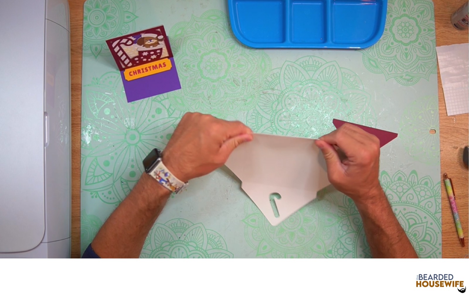 fold the envelope along the score line