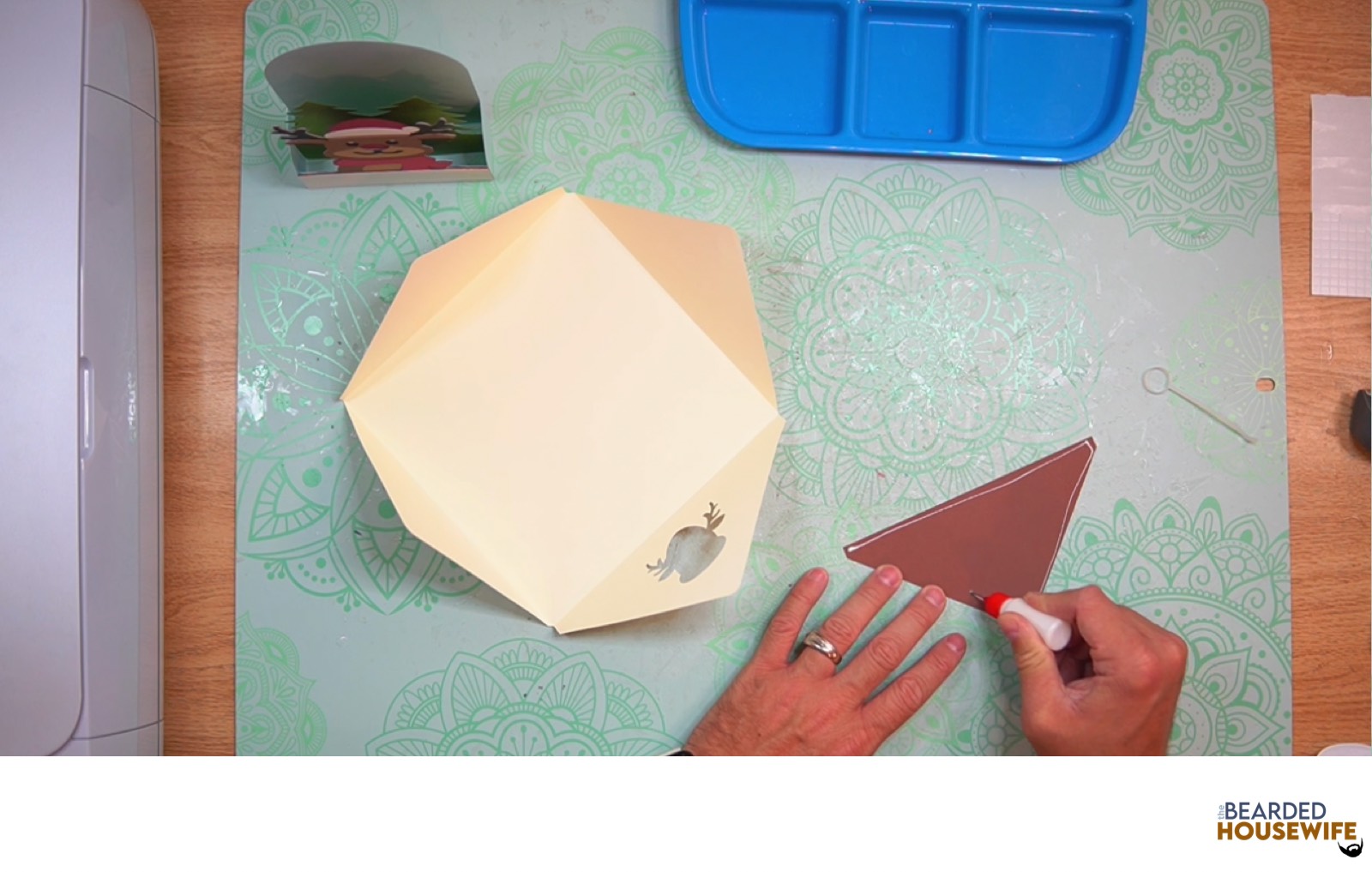 add glue along the outer edge of the inlay panel