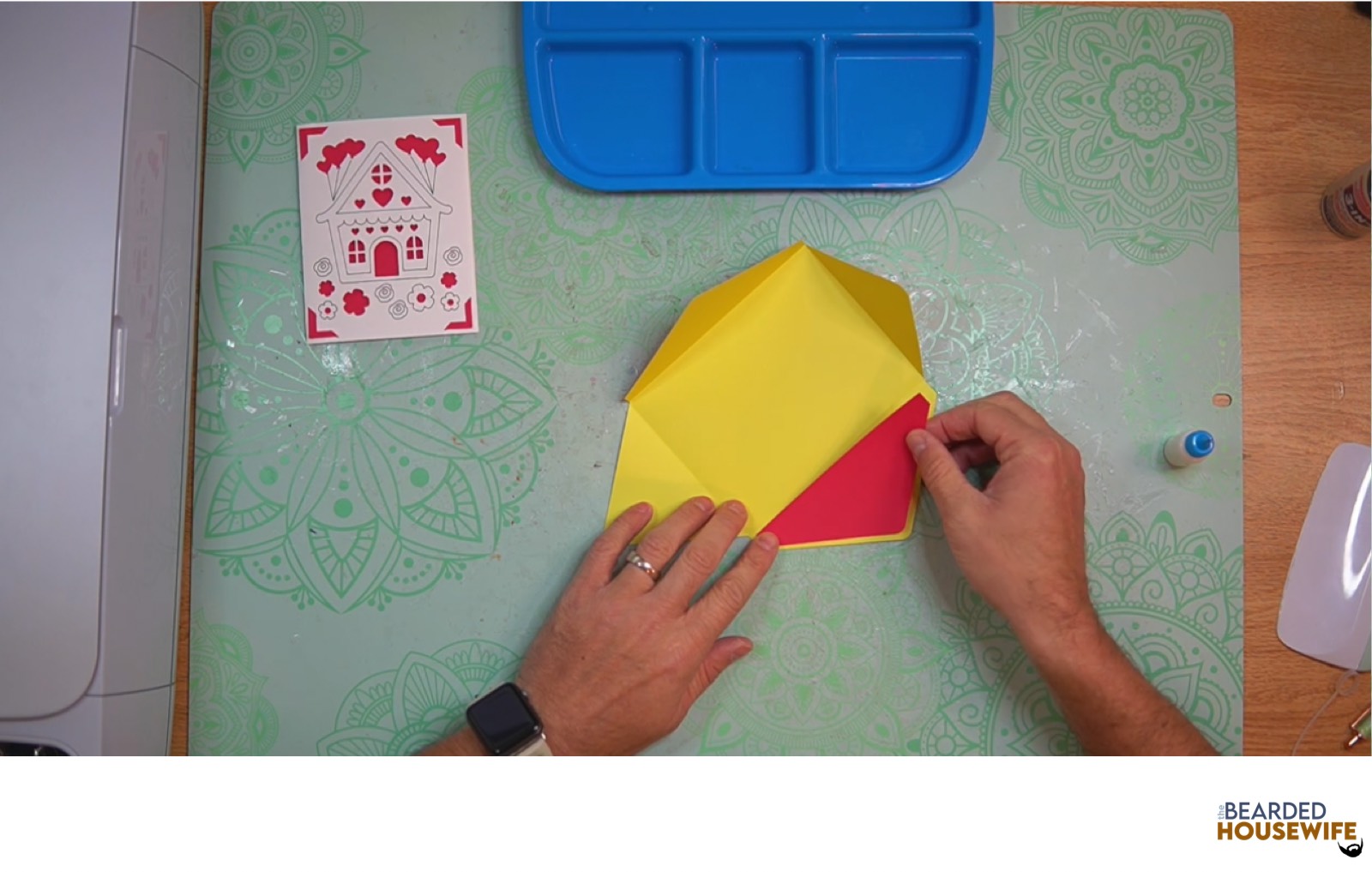 attach the inlay to the cutout on the envelope flap