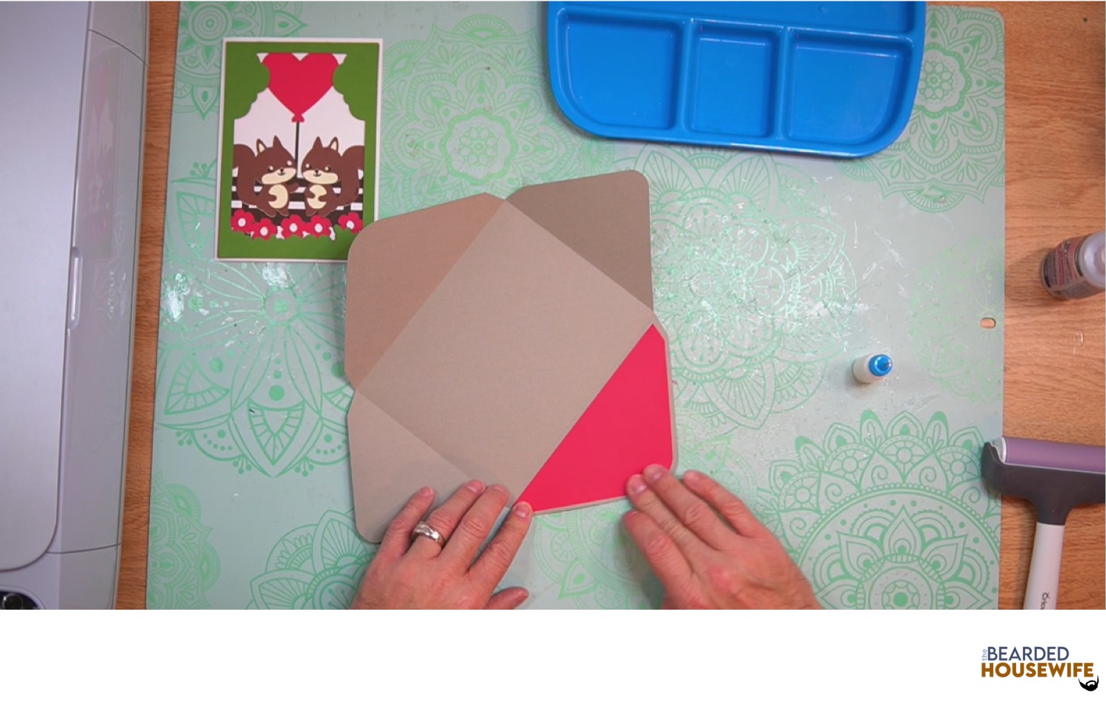 attach the inlay over the cutout on the envelope