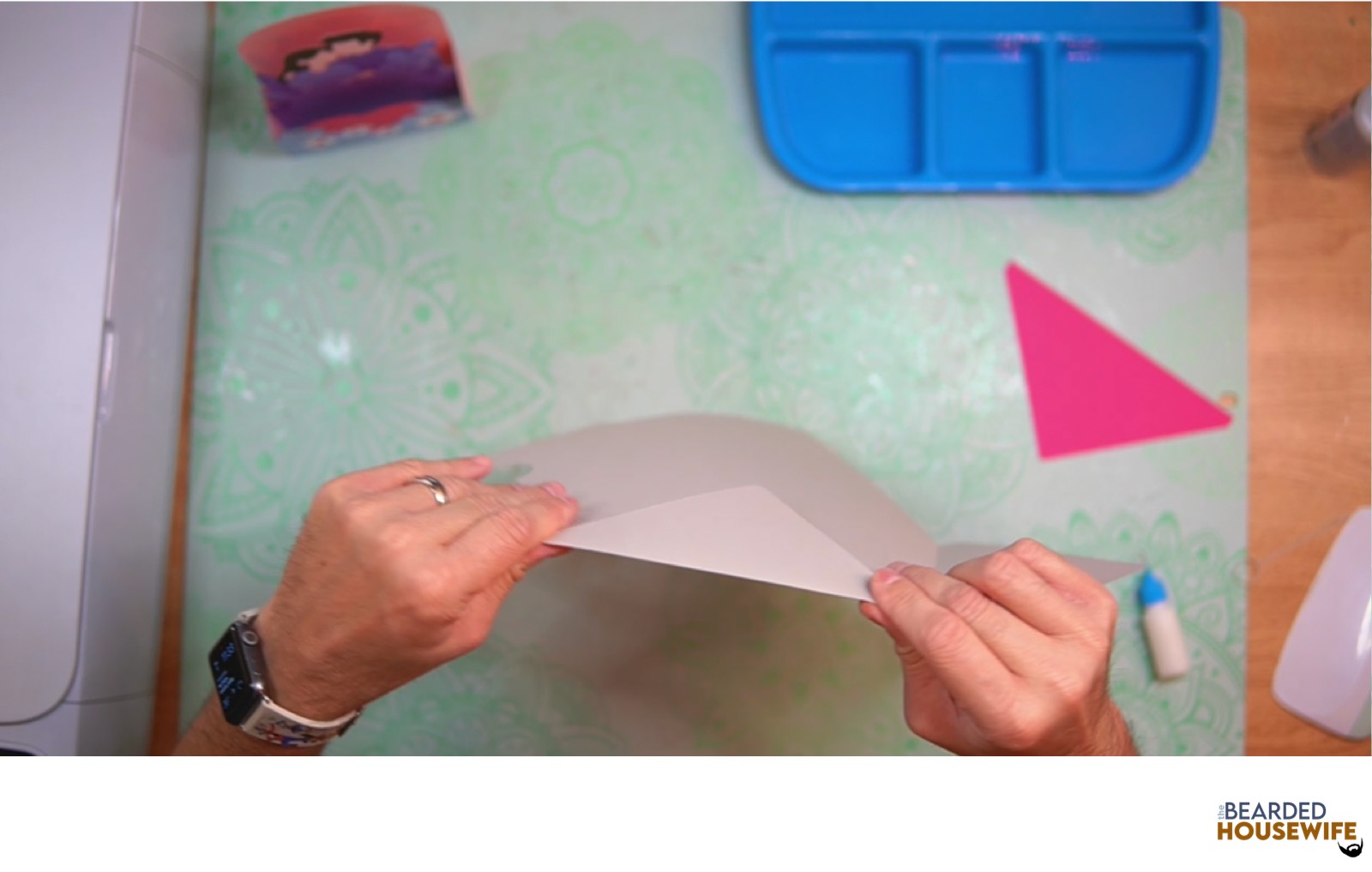 fold the envelope along the score lines