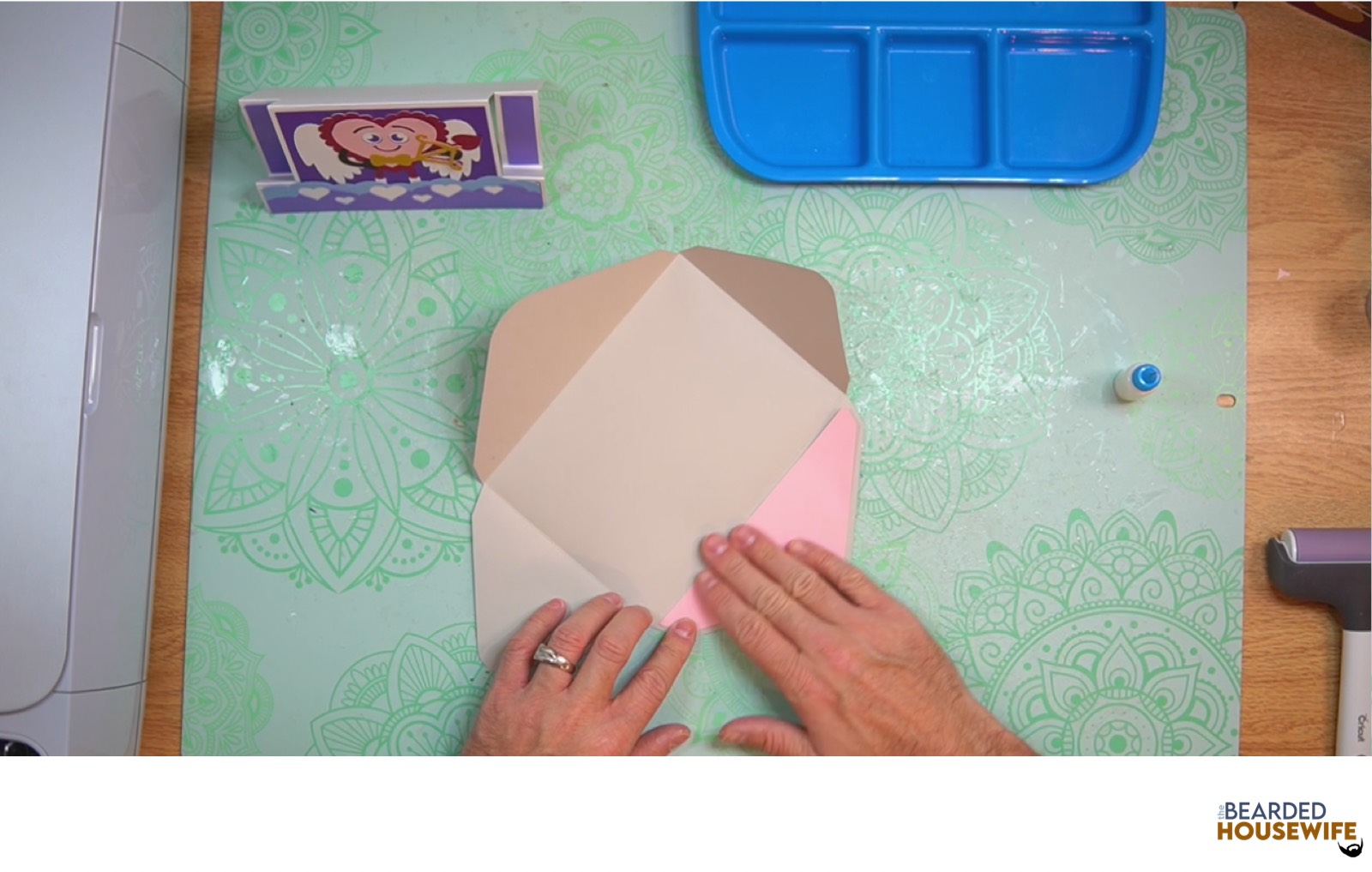 add the panel over the cutout on the envelope