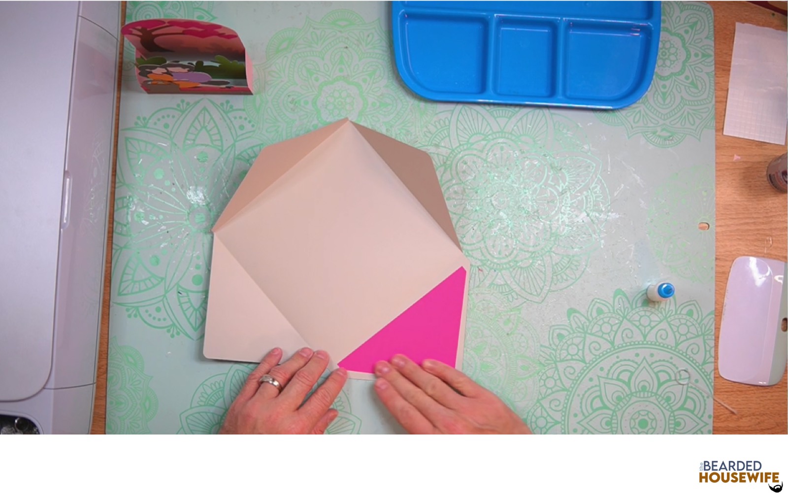 add the inlay over the cutout on the envelope