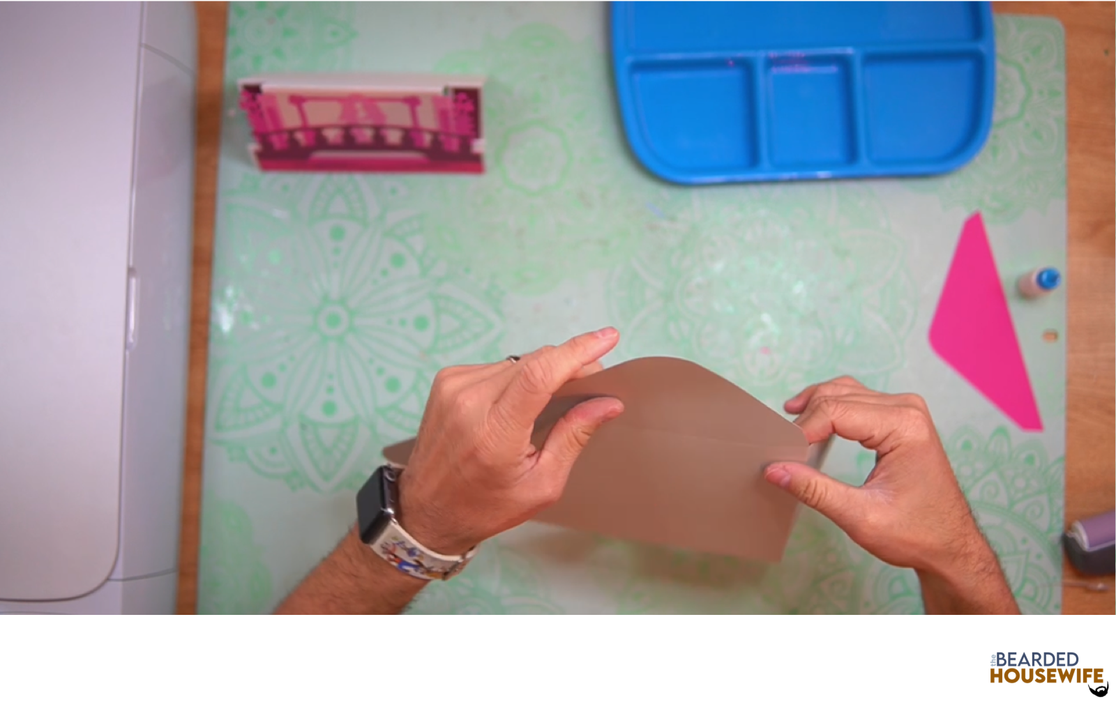 fold the envelope along the score lines