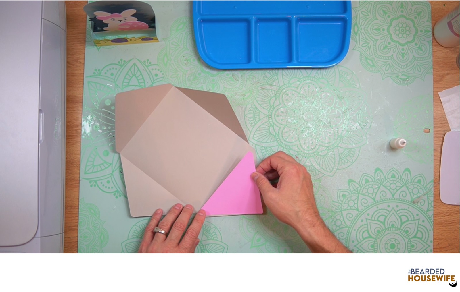 attach inlay to the cutout on the envelope flap