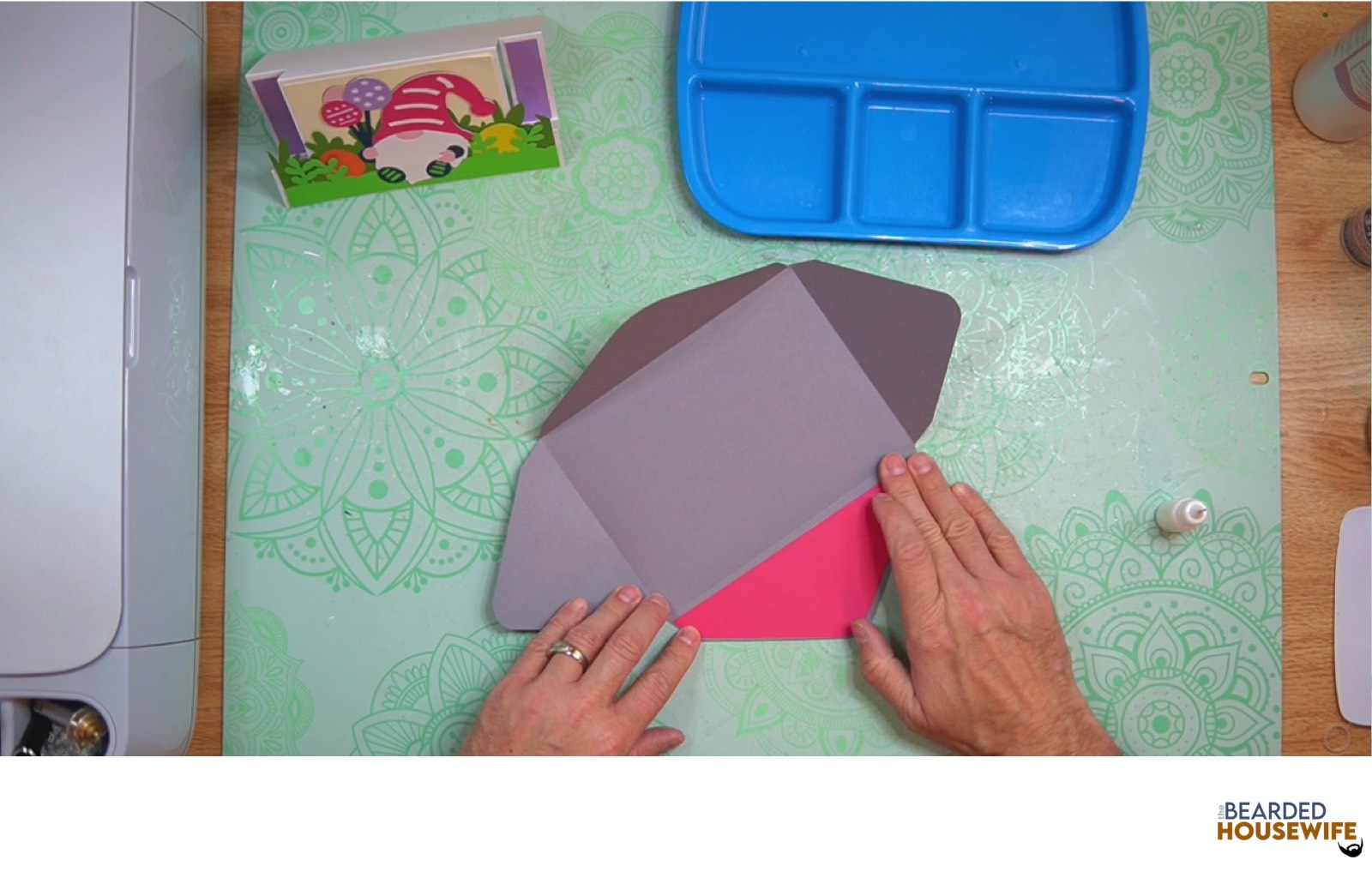 attach the inlay to the cutout on the envelope flap