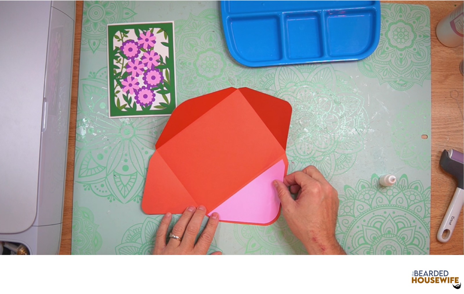 attach the inlay over the cutout on the envelope