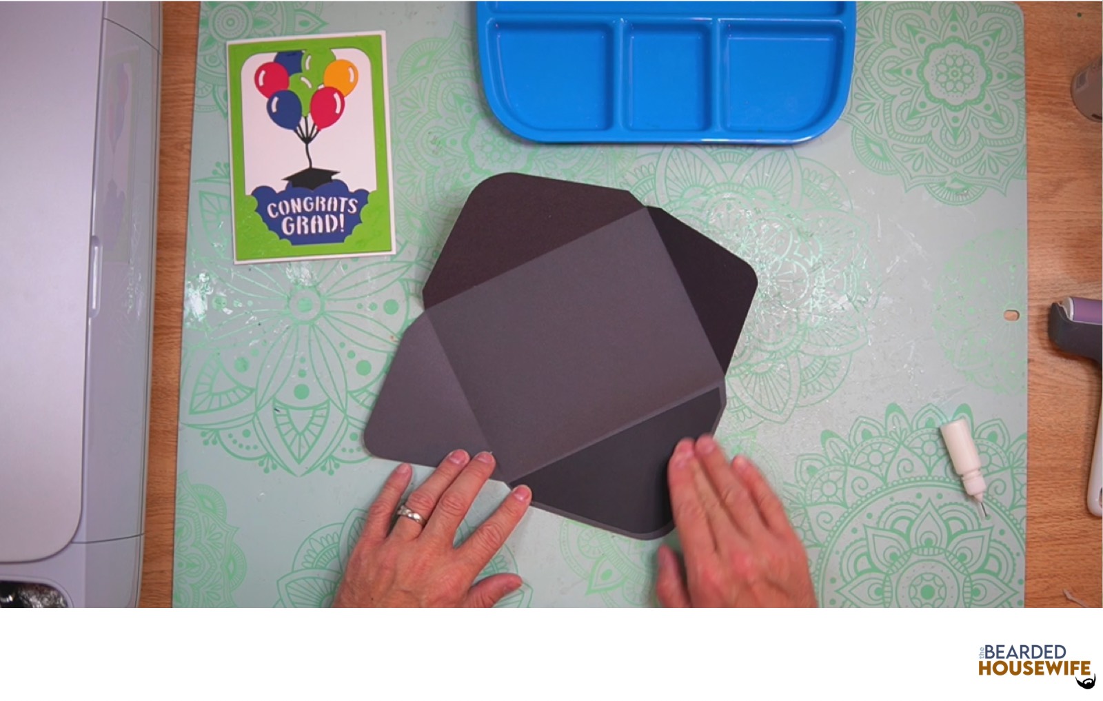 attach the inlay over the cutout on the envelope flap
