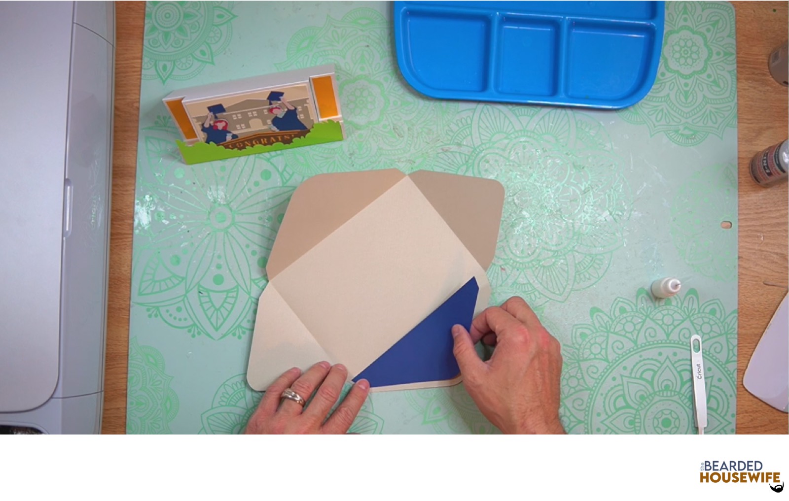 attach the inlay to the envelope