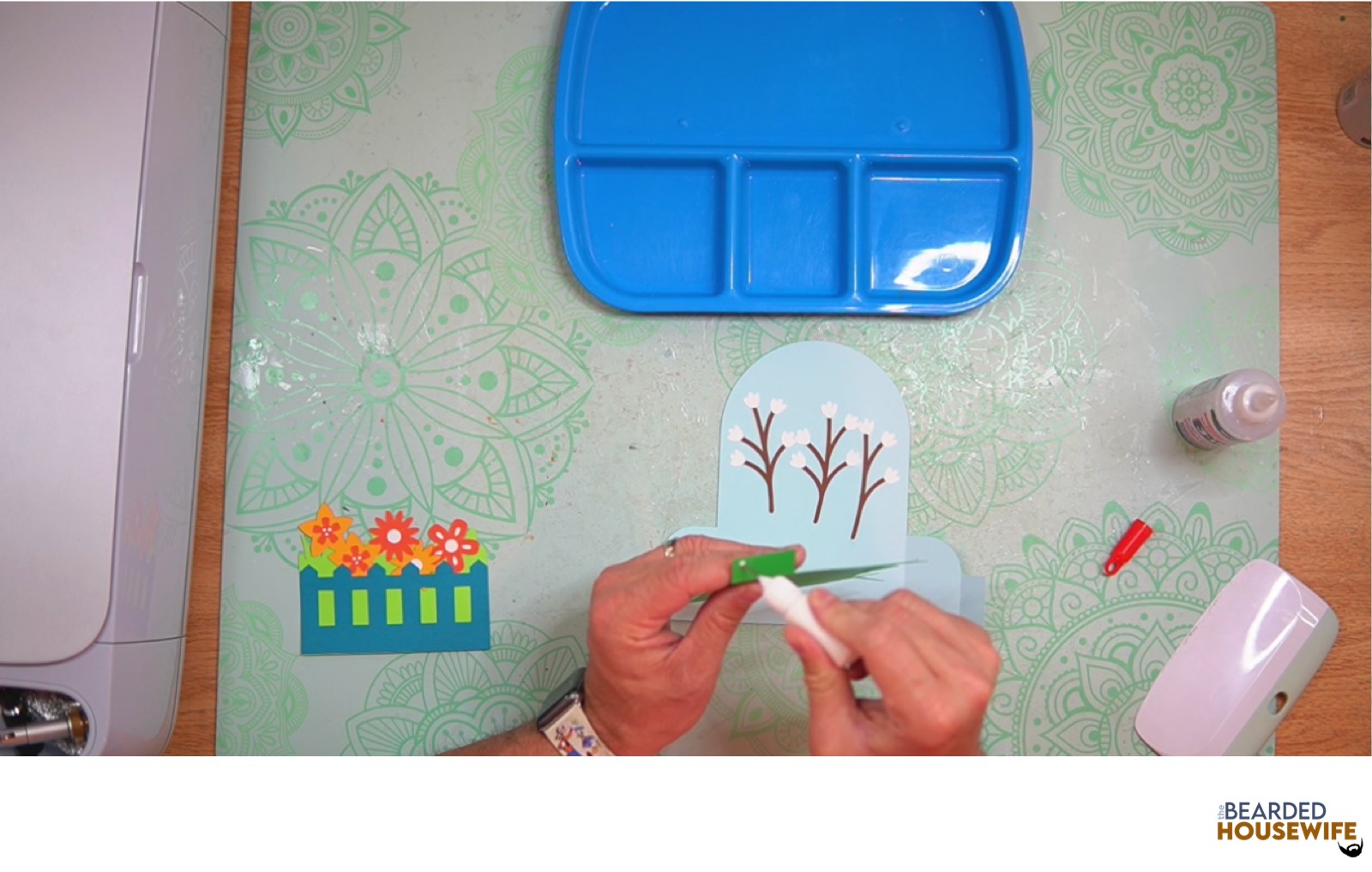 add glue to the left tab on the inside tab piece