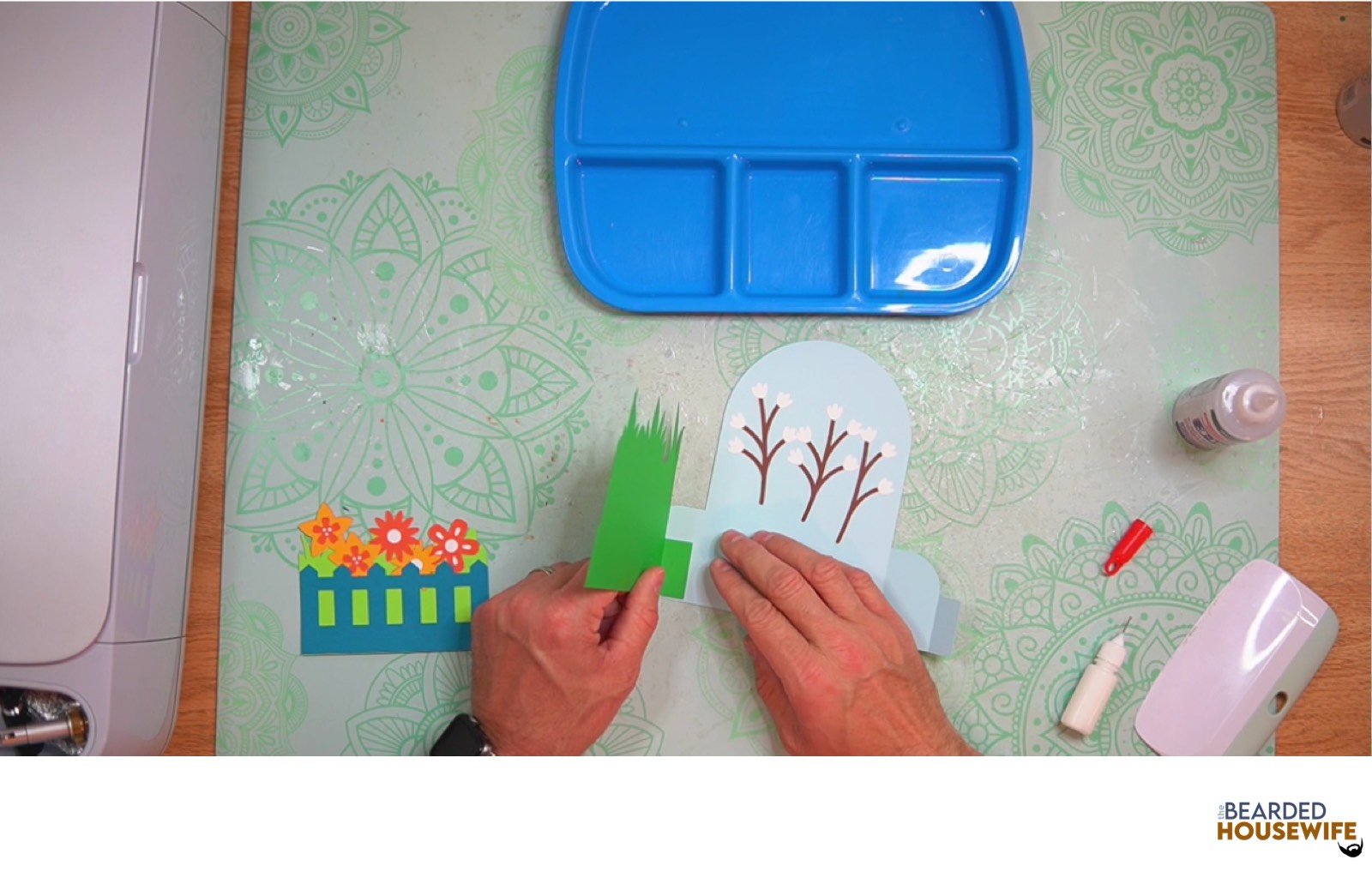 attach the tab piece to the left side of the card base